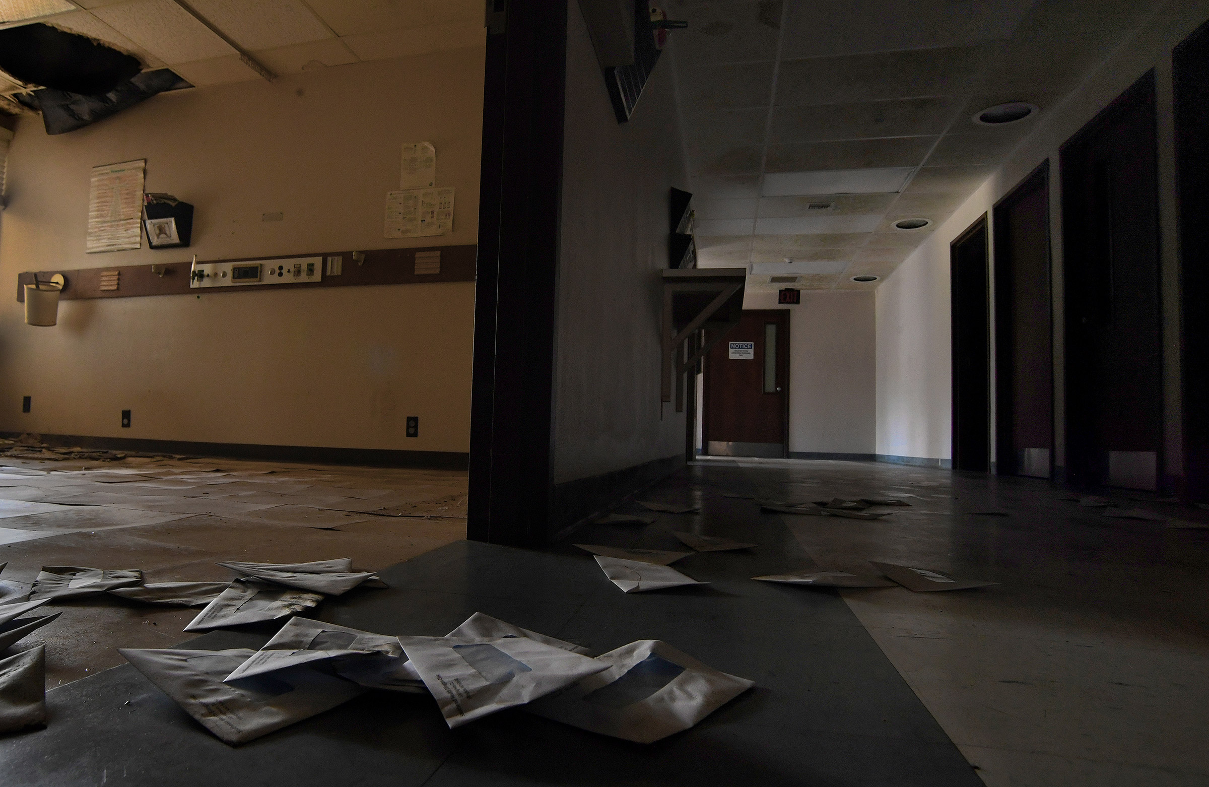 Billing envelopes litter the floor of the shuttered Southeast Health Center
                      in Ellington, Missouri on July 19, 2019. (Michael S. Williamson—The Washington Post/Getty Images)
