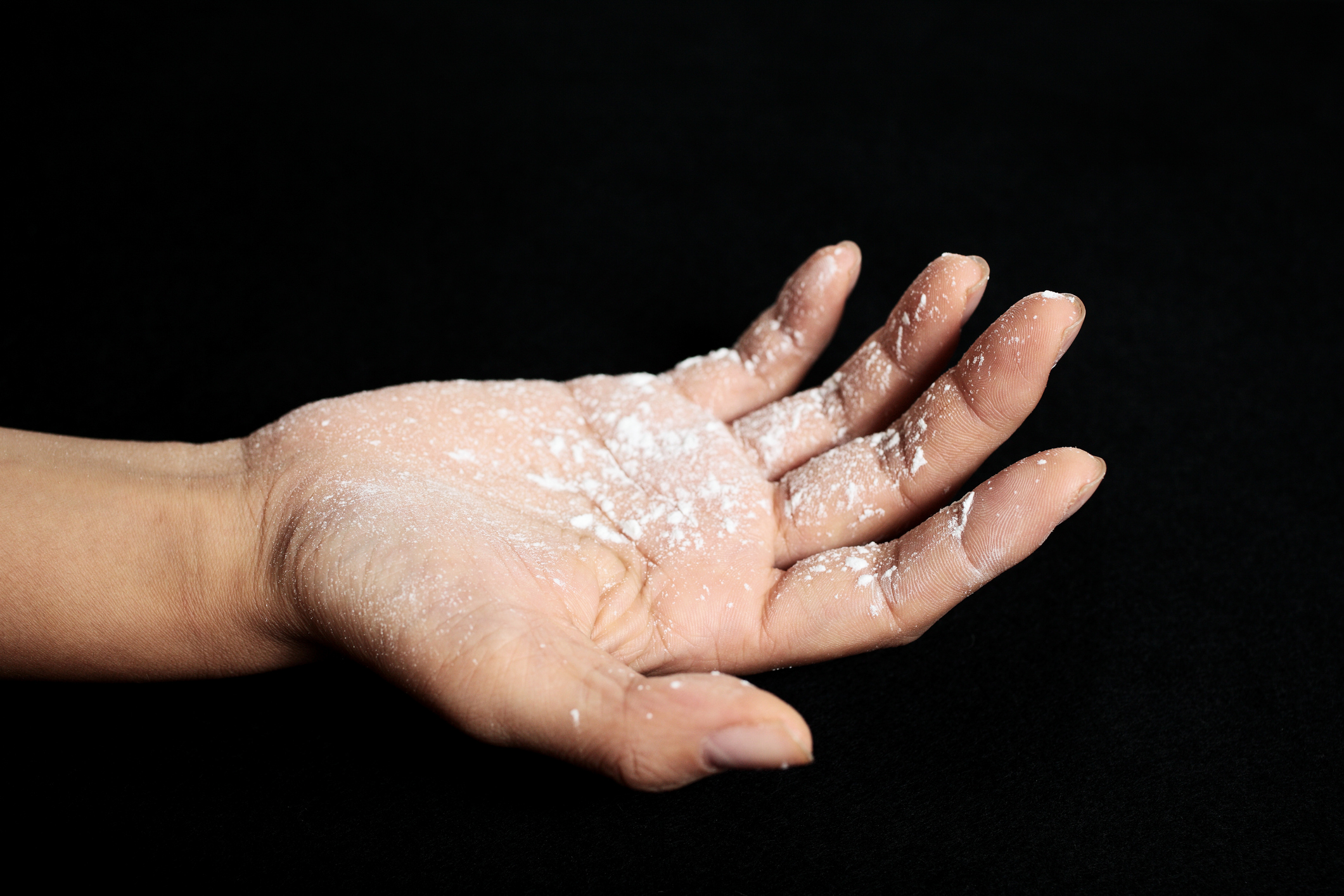 Hand covered with talcum powder
