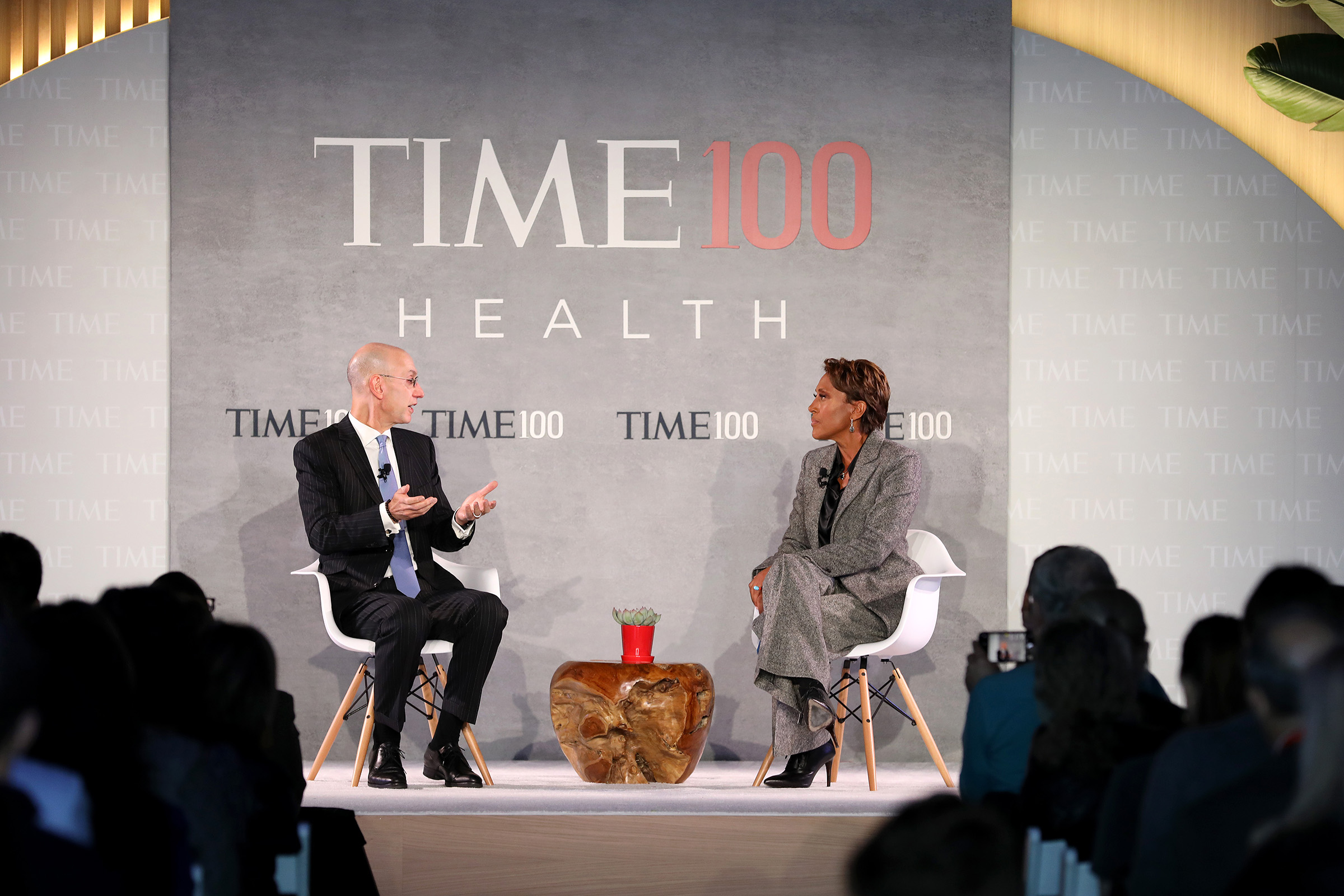 Commissioner of the NBA, Adam Silver (L), speaks with news broadcaster, Robin Roberts, onstage during the TIME 100 Health Summit at Pier 17 in New York City on Oct. 17, 2019. (Cindy Ord—Getty Images for TIME 100 Health)