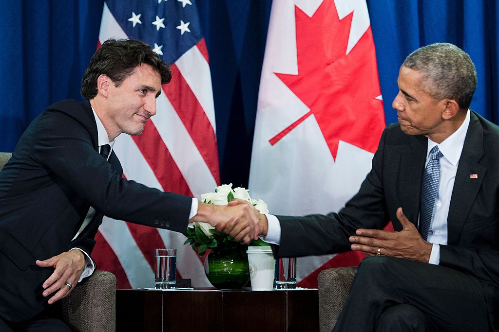 Canada's Prime Minister Justin Trudeau and former U.S. President Barack Obama shake hands at the end of a bilateral meeting at the Asia-Pacific Economic Cooperation summit on Nov. 20, 2016 in Lima, Peru. (Brendan Smialowski&mdash;AFP/Getty Images)
