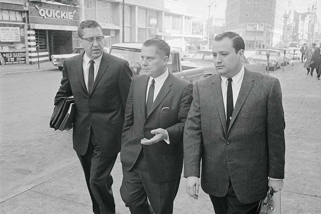 Jimmy Hoffa (center) with his attorney William Bufalino (left) and an aide, leaving federal court after Hoffa was convicted of jury tampering (Bettmann Archive/ Getty Images)