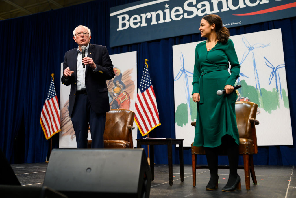 Democratic Presidential candidate Bernie Sanders (I-VT) and U.S. Rep. Alexandria Ocasio-Cortez (D-NY) field questions from audience members at the Climate Crisis Summit at Drake University on November 9, 2019 in Des Moines, Iowa. (Stephen Maturen&mdash;Getty Images)
