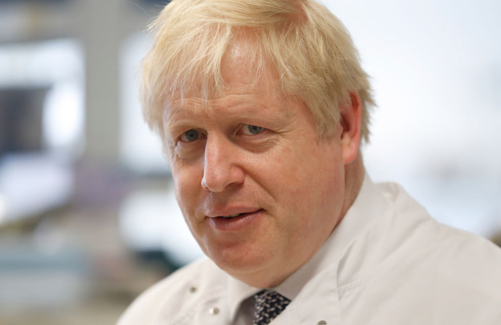 British Prime Minister Boris Johnson during a visit to the East Midlands and East of England Genomic Laboratory Hub at Addenbrooke's Hospital on October 31, 2019 in Cambridge, England. (Alastair Grant—WPA Pool/Getty Images)