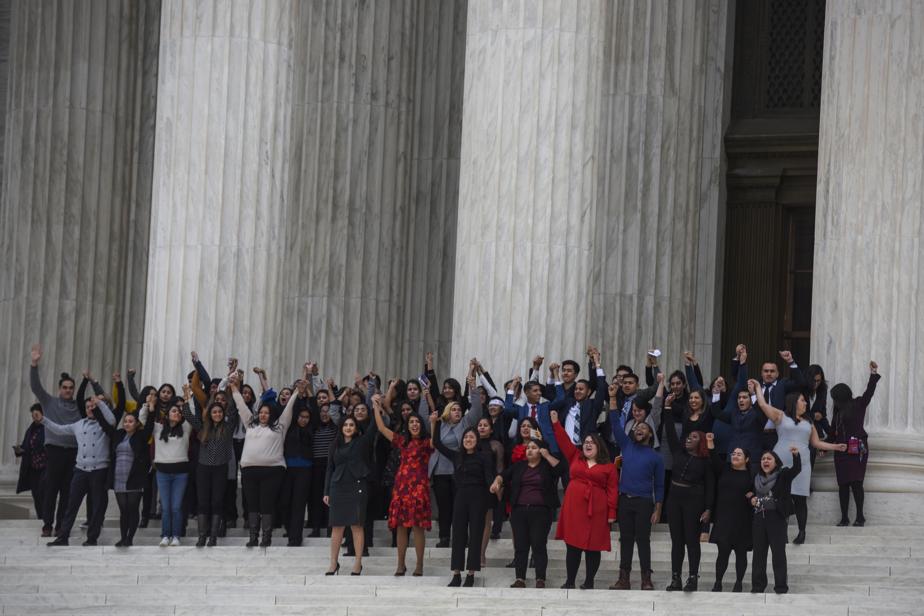 DACA plaintiffs leave the United States Supreme Court, where the Court is hearing arguments on Deferred Action for Childhood Arrivals that could impact the fates of nearly 700,000 young immigrants.  on Nov. 12, 2019, in Washington, D.C. (Jahi Chikwendiu—The Washington Post/Getty Images)