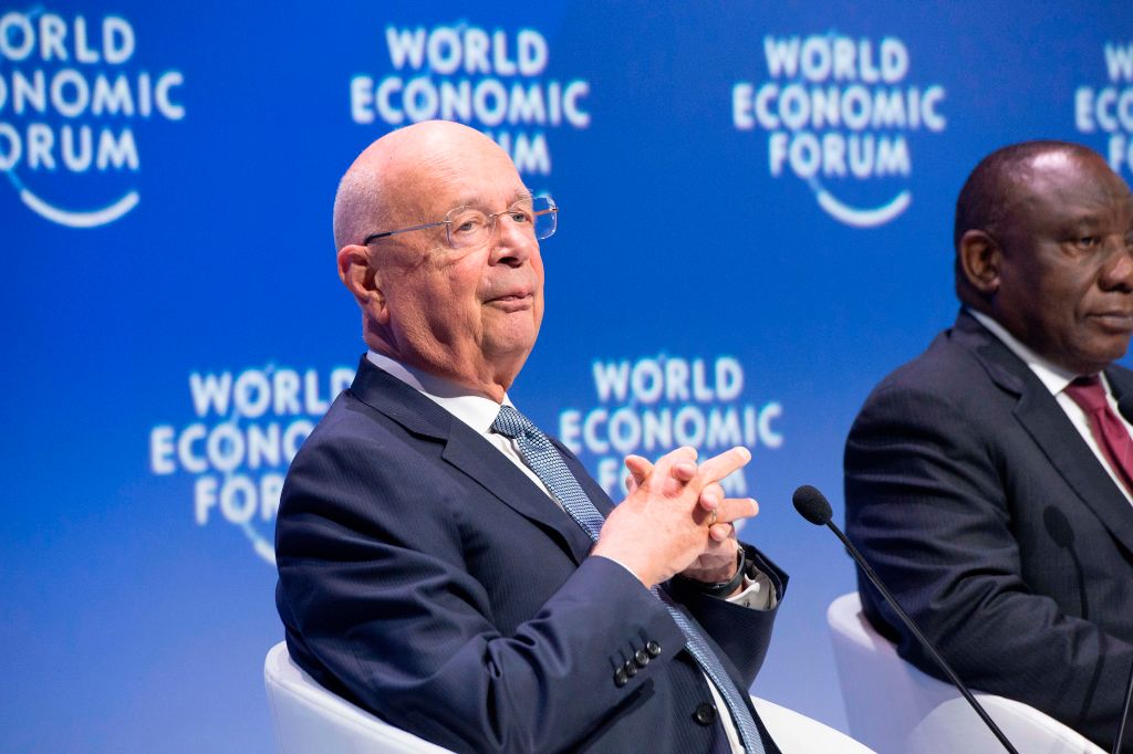 Klaus Schwab, founder of the World Economic Forum sits next to South Africa's President Cyril Ramaphosa, at the plenary session of African Leaders at the World Economic Forum Africa meeting at the Cape Town International Convention Centre, in Cape Town on September 5, 2019. (AFP via Getty Images)