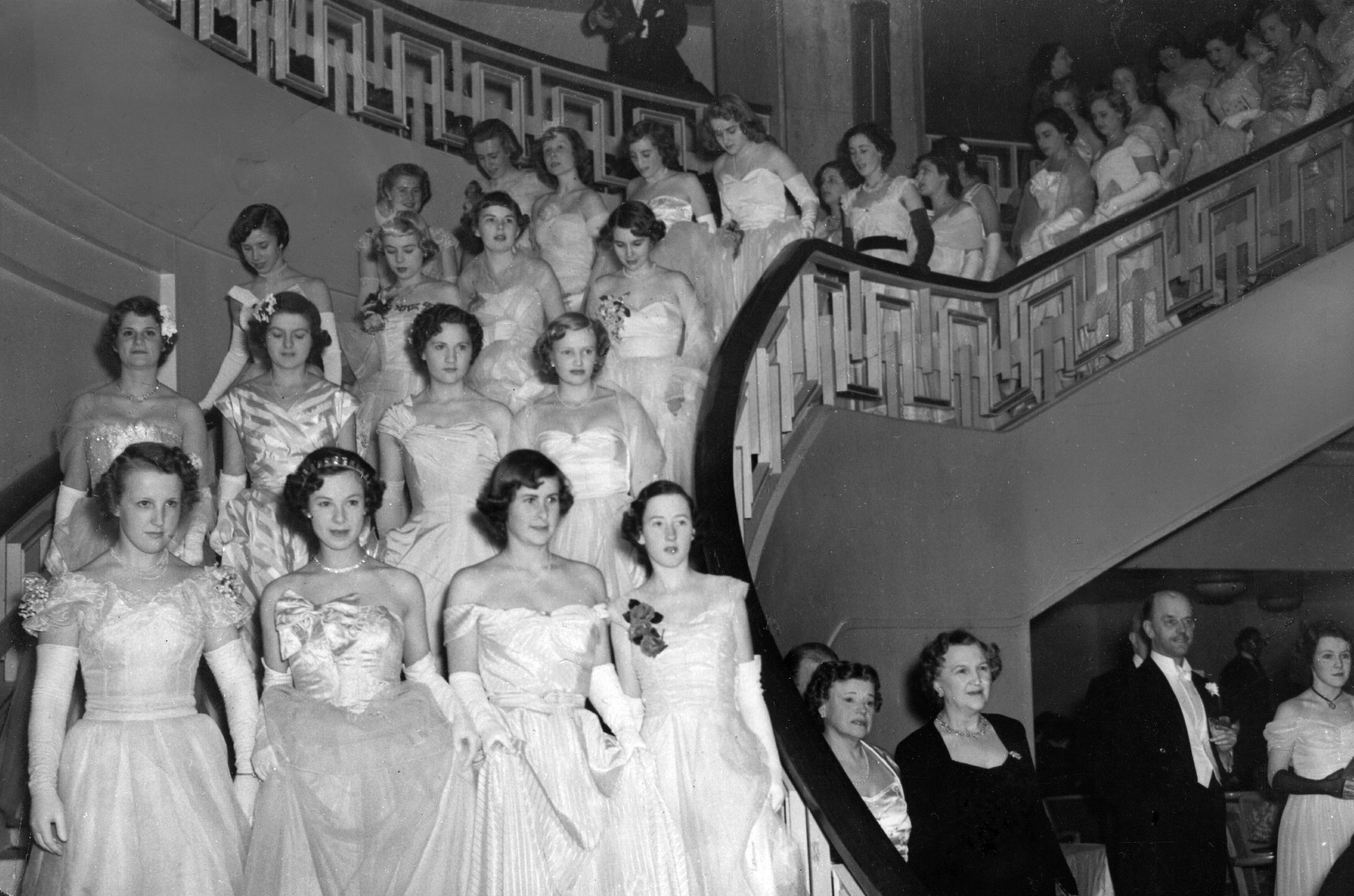 May 19, 1950:  The massed ranks of debutantes at the Queen Charlotte's Ball at Grosvenor House descend into the ballroom. (Keystone/Getty Images)