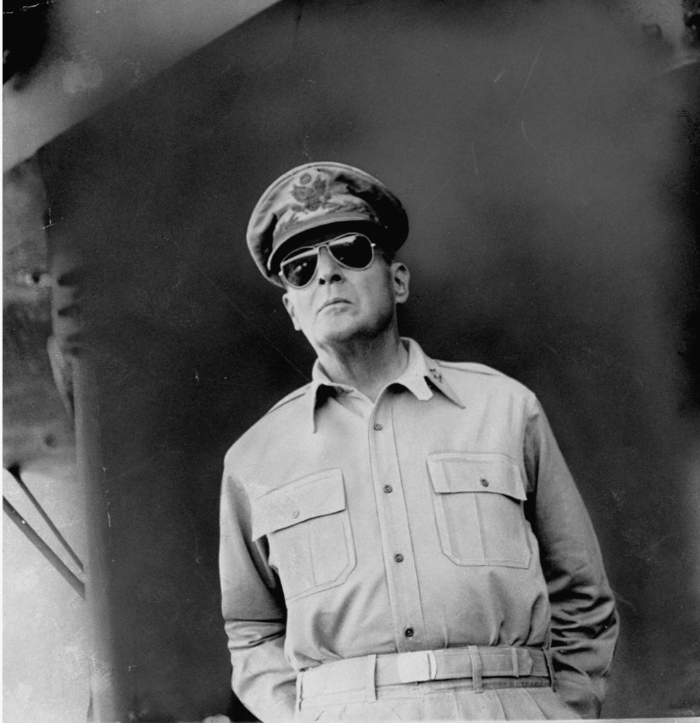 Gen. Douglas MacArthur on deck of a ship en route to USAF landing site at Lingayen Gulf in World War II return to the Philippine Islands. (Carl Mydans&mdash;The LIFE Picture Collection/Getty Images)