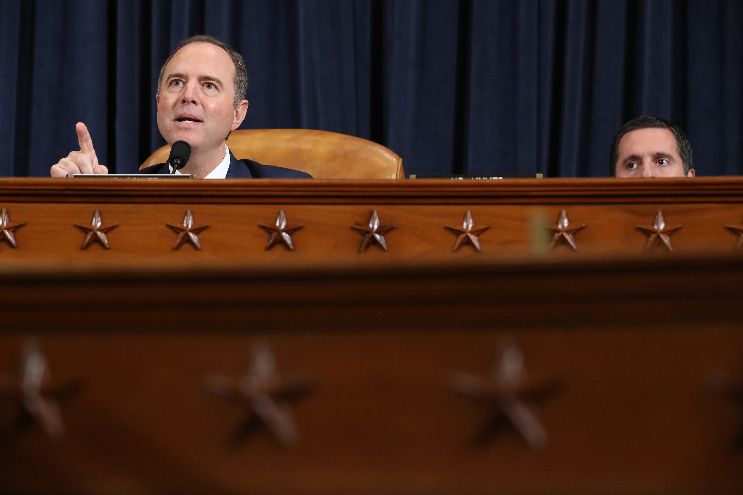 House Intelligence Committee Chairman Rep. Adam Schiff (D-CA) (L) delivers closing remarks as ranking member Rep. Devin Nunes (R-CA) listens at the end of an impeachment inquiry hearing on Capitol Hill on Nov. 21, 2019 in Washington, DC. (Chip Somodevilla—Getty Images)