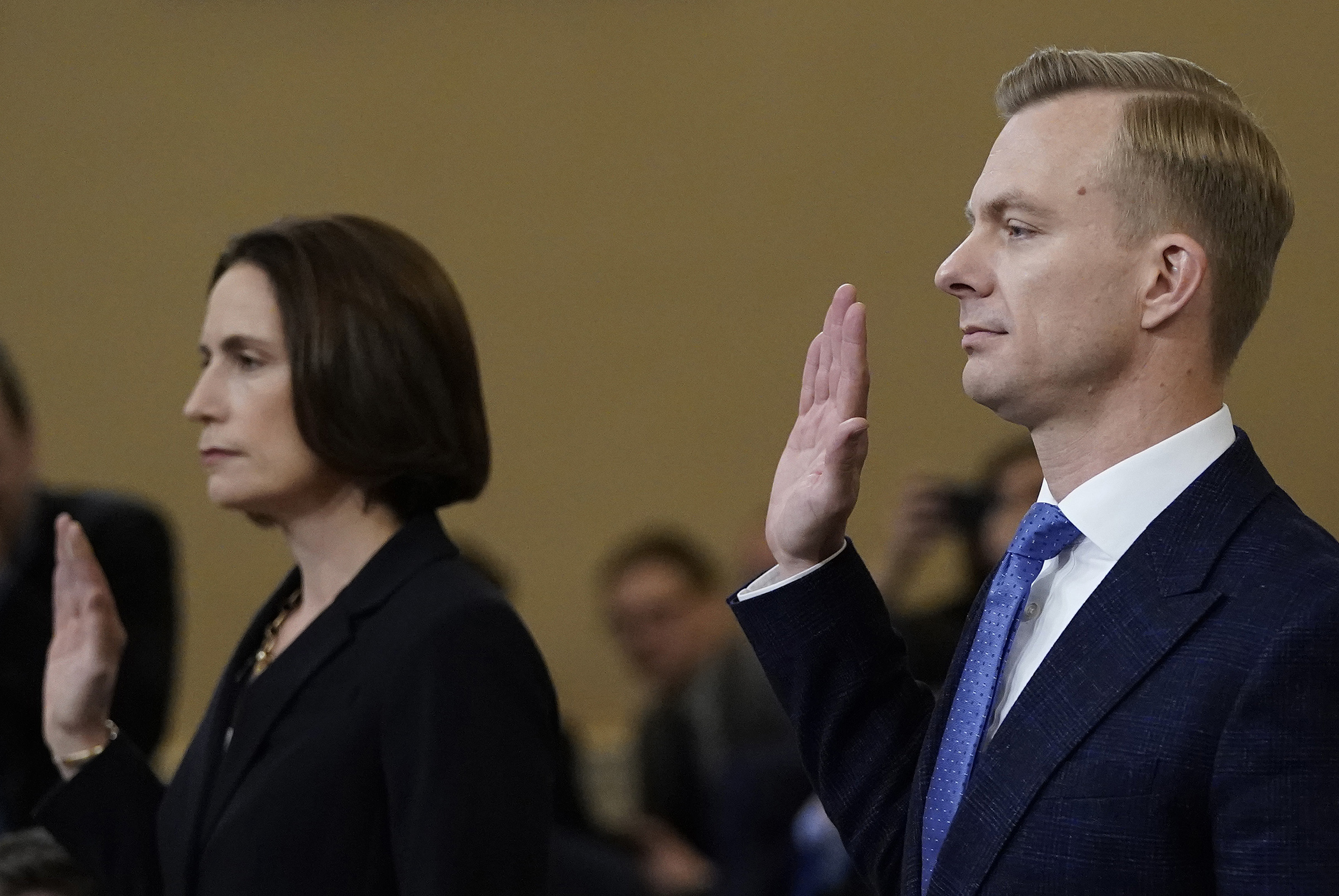 Fiona Hill, the National Security Council’s former senior director for Europe and Russia, and David Holmes, an official from the American embassy in Ukraine, are sworn in prior to testifying before the House Intelligence Committee on Capitol Hill on Nov. 21, 2019. (Win McNamee—Getty Images)