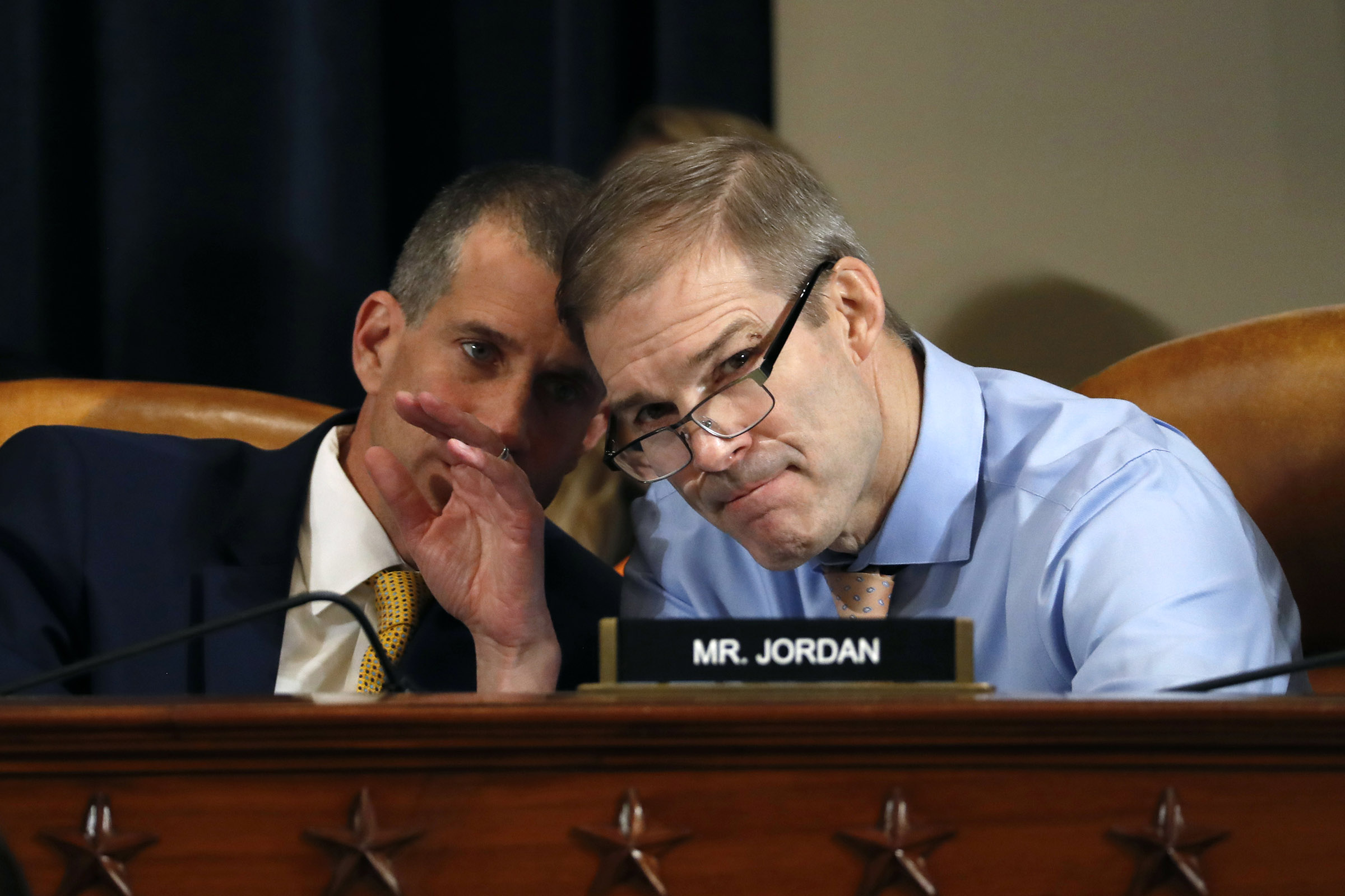 Rep. Jim Jordan (R-OH) (R) and minority counsel Steve Castor confer during a hearing before the House Intelligence Committee on Capitol Hill in Washington D.C. on Nov. 19, 2019. (Jacquelyn Martin—Getty Images)