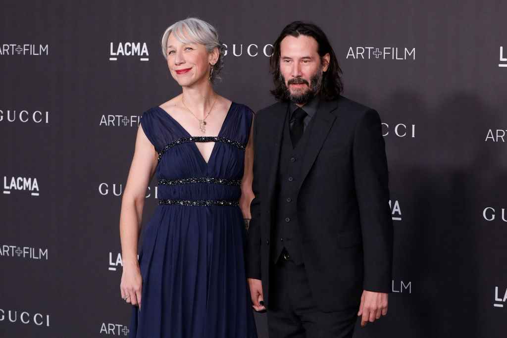 Keanu Reeves and Alexandra Grant arrive on the red carpet
