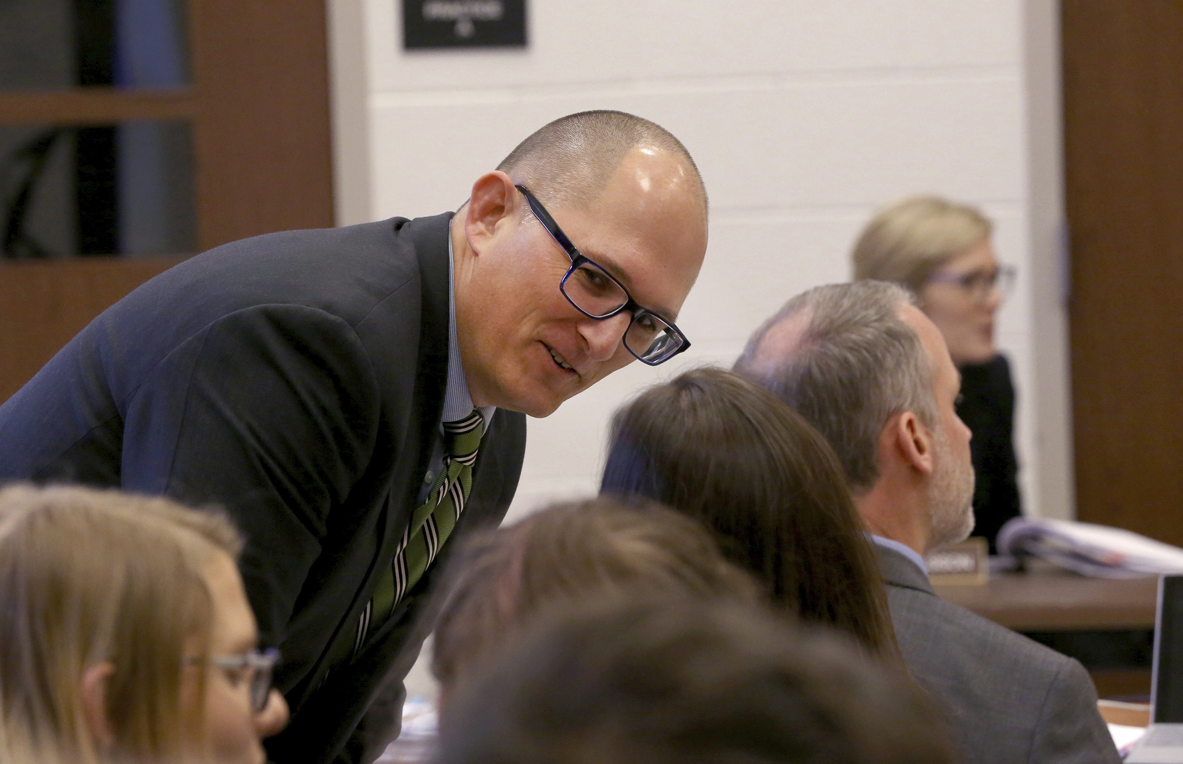 High school teacher Peter Vlaming chats at a West Point School Board hearing in West Point, Virginia on Dec. 6, 2018. (Shelby Lum—AP)