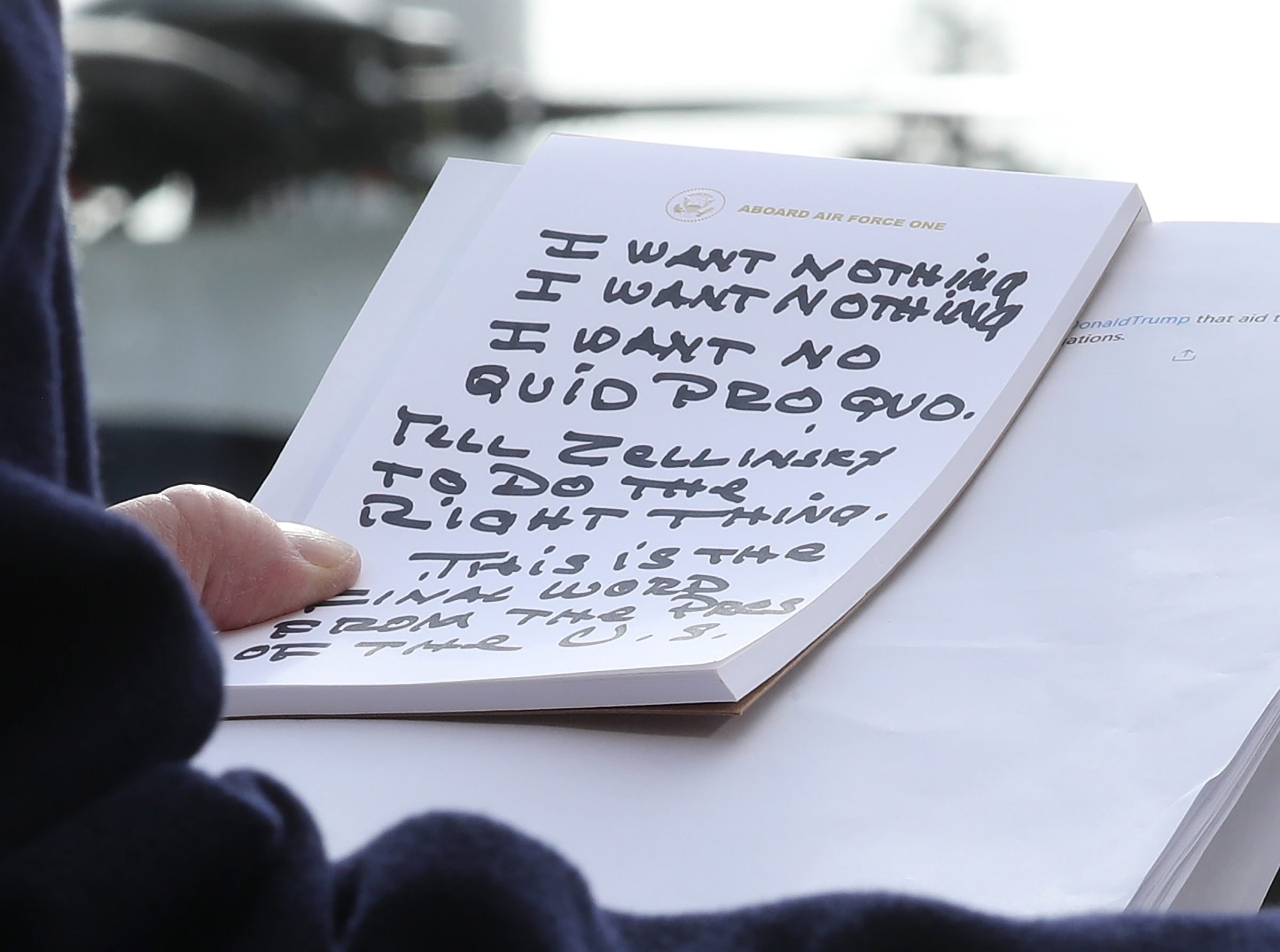 U.S. President Donald Trump holds his notes while speaking to the media before departing from the White House in Washington D.C. on Nov. 20, 2019. (Mark Wilson—Getty Images)