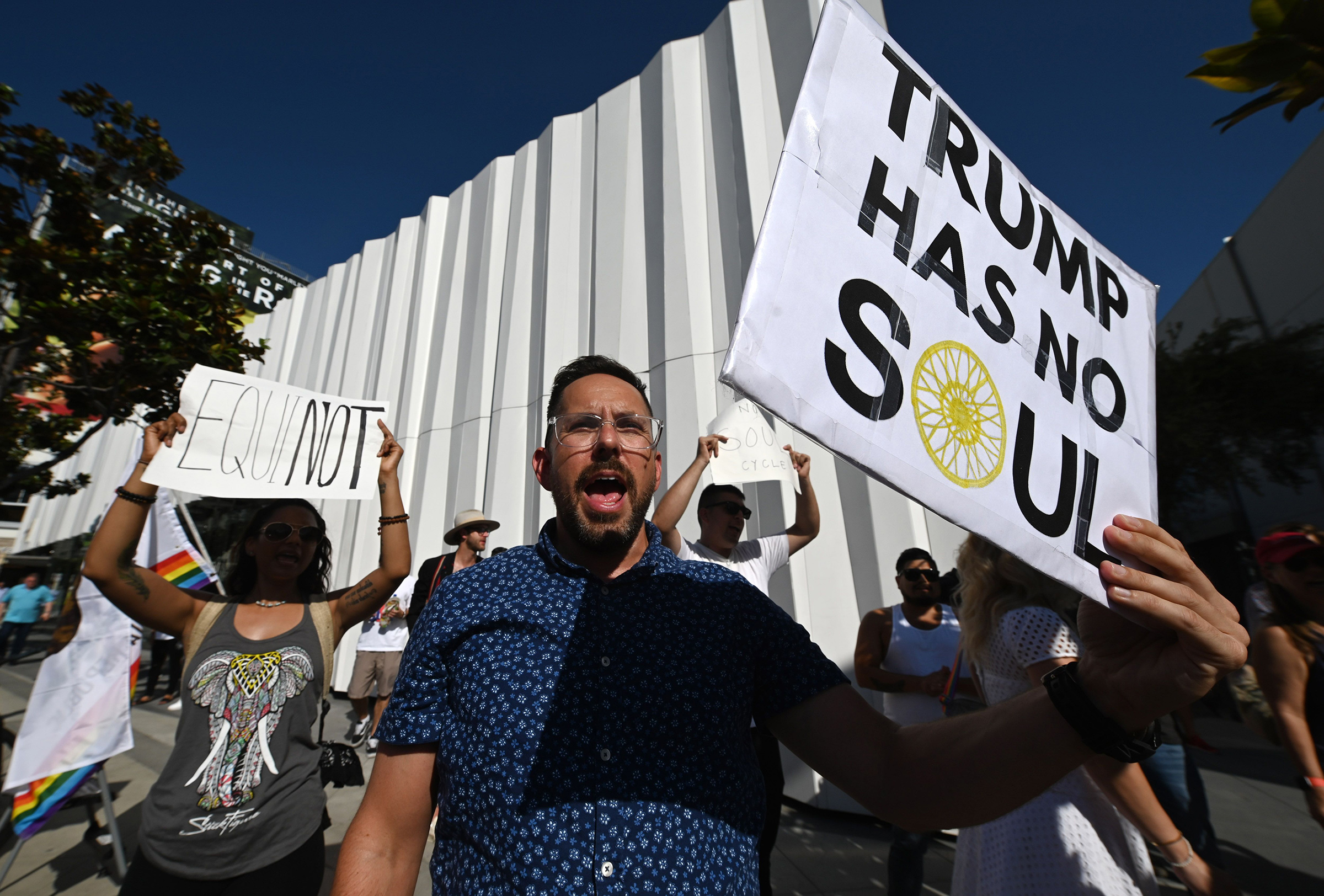 Protesters outside an Equinox in West Hollywood, Calif., on Aug. 9 (Robyn Beck—AFP/Getty Images)