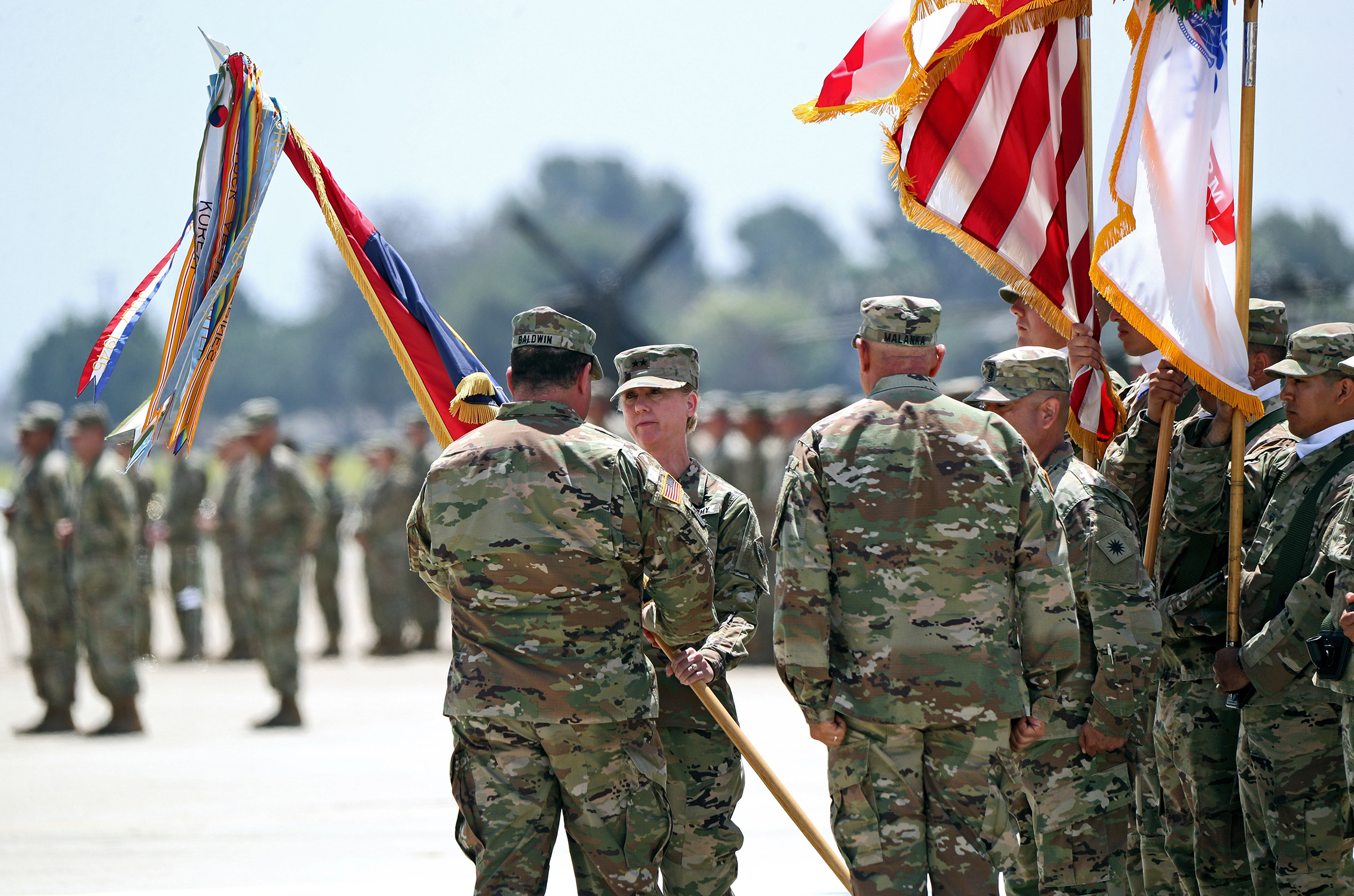 Maj. General Laura L. Yeager, second from left, is joined by Adjutant General, California Military Department Maj. Gen. David S. Baldwin, left, during Change of Command Ceremony for the 40th Infantry Division, at the Joint Forces Training Base in Los Alamitos, on June 29, 2019.