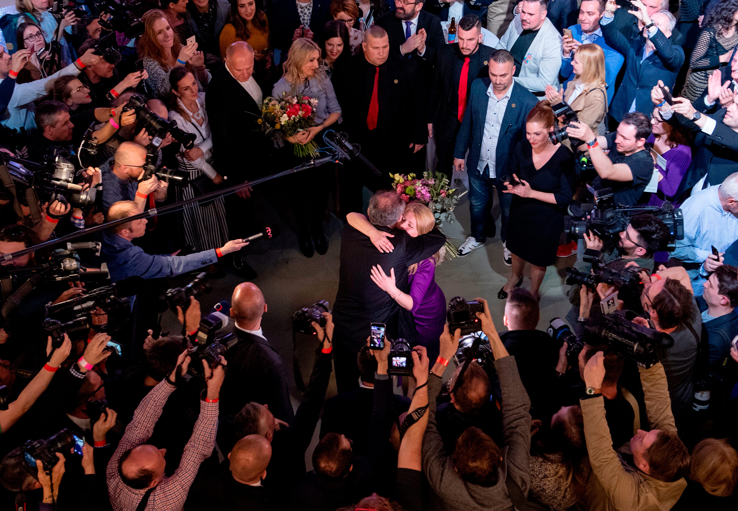 Slovak President Andrej Kiska congratulates Slovakis's President elect Zuzana Caputova as she wins the election in Bratislava, Slovakia on March 30, 2019.