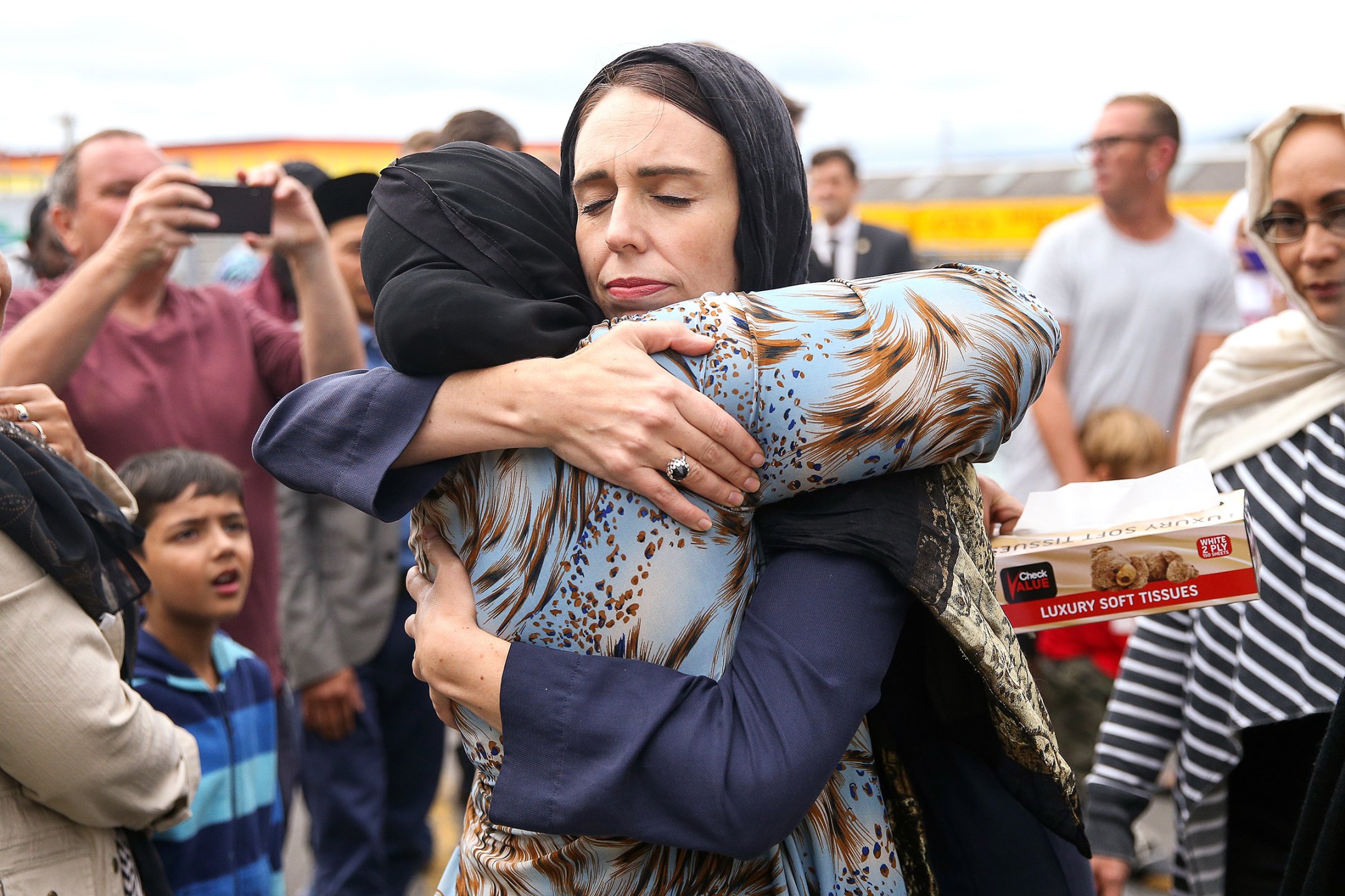 In the wake of the Christchurch attack, New Zealand Prime Minister Jacinda Ardern hugs a mosque-goer at the Kilbirnie Mosque in Wellington on March 17.