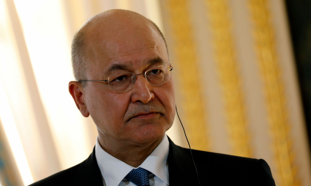 Iraqi President Barham Salih talks at a press conference with French President Emmanuel Macron at the Presidential Palace on February 25, 2019 in Paris, France. (Antoine Gyori––Corbis/Getty Images)