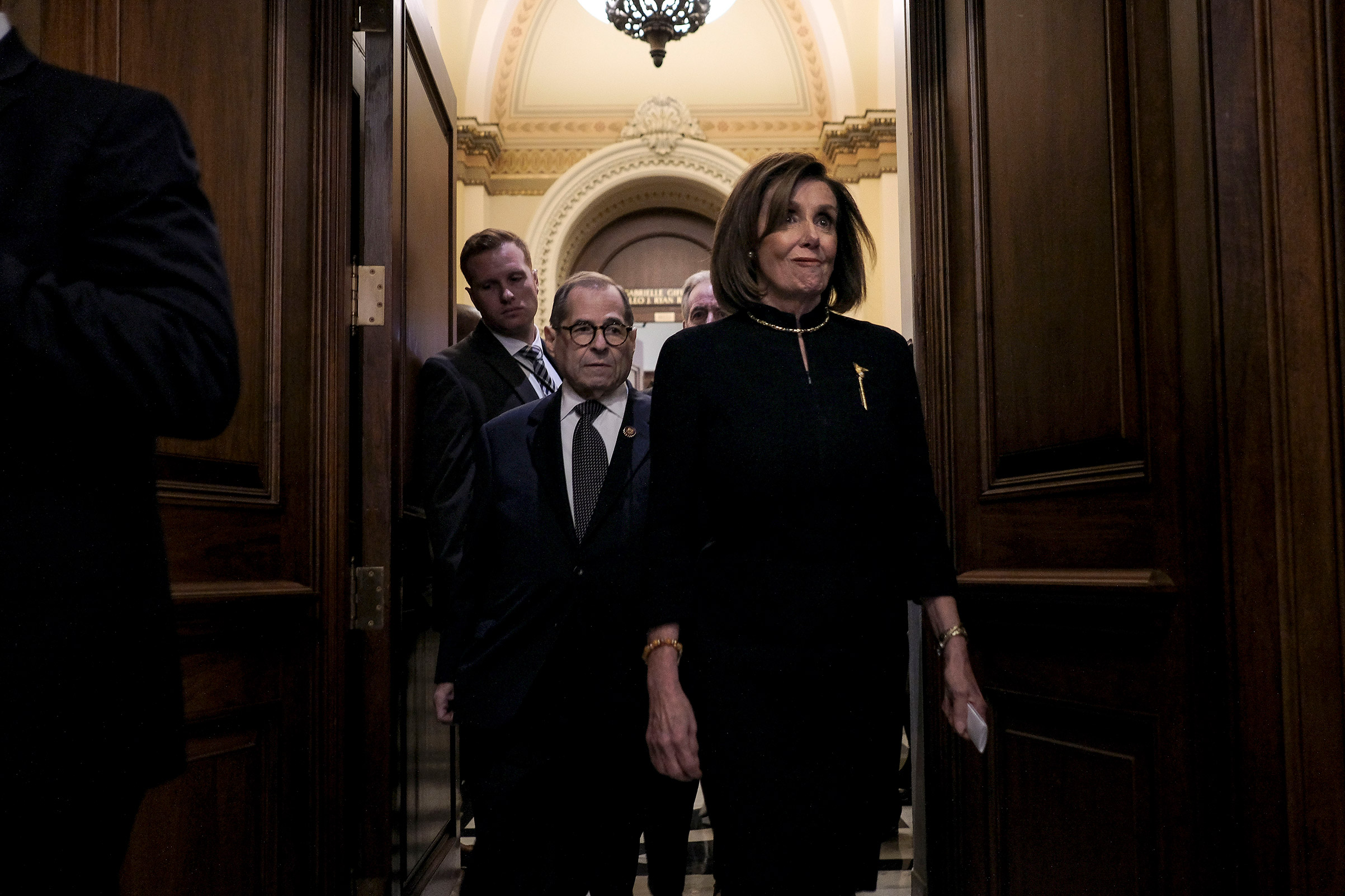 Speaker Nancy Pelosi (D-Calif.) and Judiciary Chairman Jerry Nadler (D-N.Y.) walk off the floor after the House vote on articles of impeachment at the Capitol in Washington, D.C. on Dec. 18, 2019. (Gabriella Demczuk for TIME)