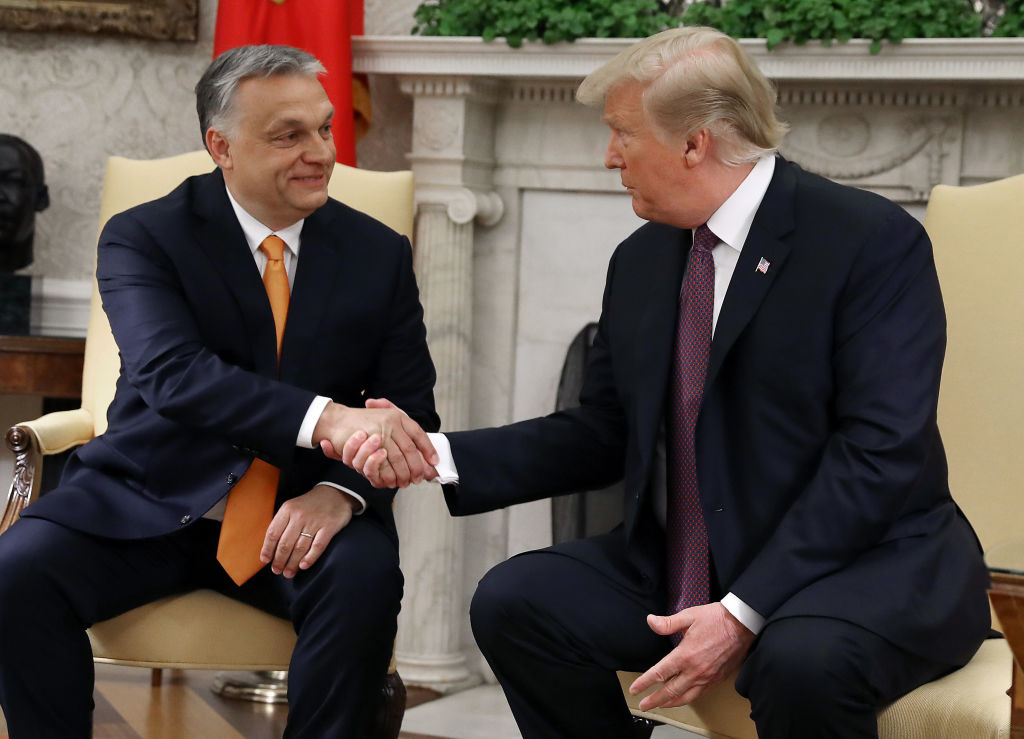 U.S. President Donald Trump shakes hands with Hungarian Prime Minister Viktor Orban during a meeting in the Oval Office on May 13, 2019 in Washington, DC. President Trump took questions on trade with China, Iran and other topics. (Mark Wilson—Getty Images)