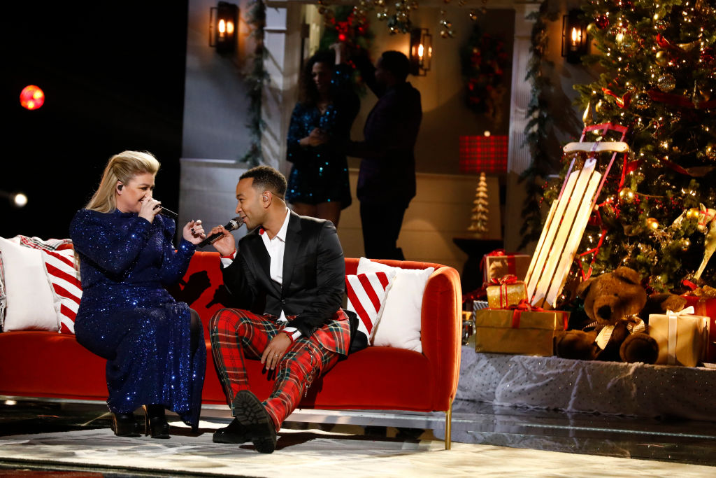 Kelly Clarkson and John Legend performing their new cover of "Baby, It's Cold Outside" on <i>The Voice</i> on Dec. 3, 2019. (Trae Patton/NBC/NBCU Photo Bank—Getty Images)