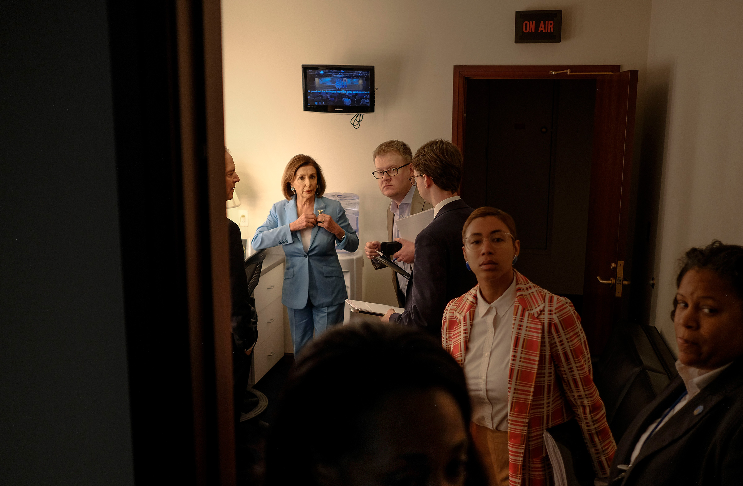 House Speaker Nancy Pelosi (D-Calif.) and House Intelligence Committee Chairman Adam Schiff (D-Calif.) enter the studio where they will speak to reporters on next steps involving the impeachment inquiry at a press conference in the Capitol in Washington, D.C. on Oct. 2. (Gabriella Demczuk for TIME)
