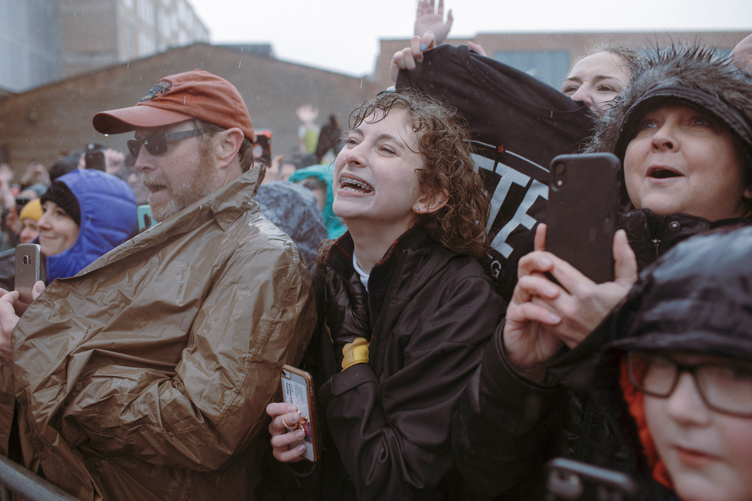 Supporters wait in the rain on April 14 for Pete Buttigieg’s presidential campaign announcement in South Bend. May 13 issue. (Elliot Ross for TIME)