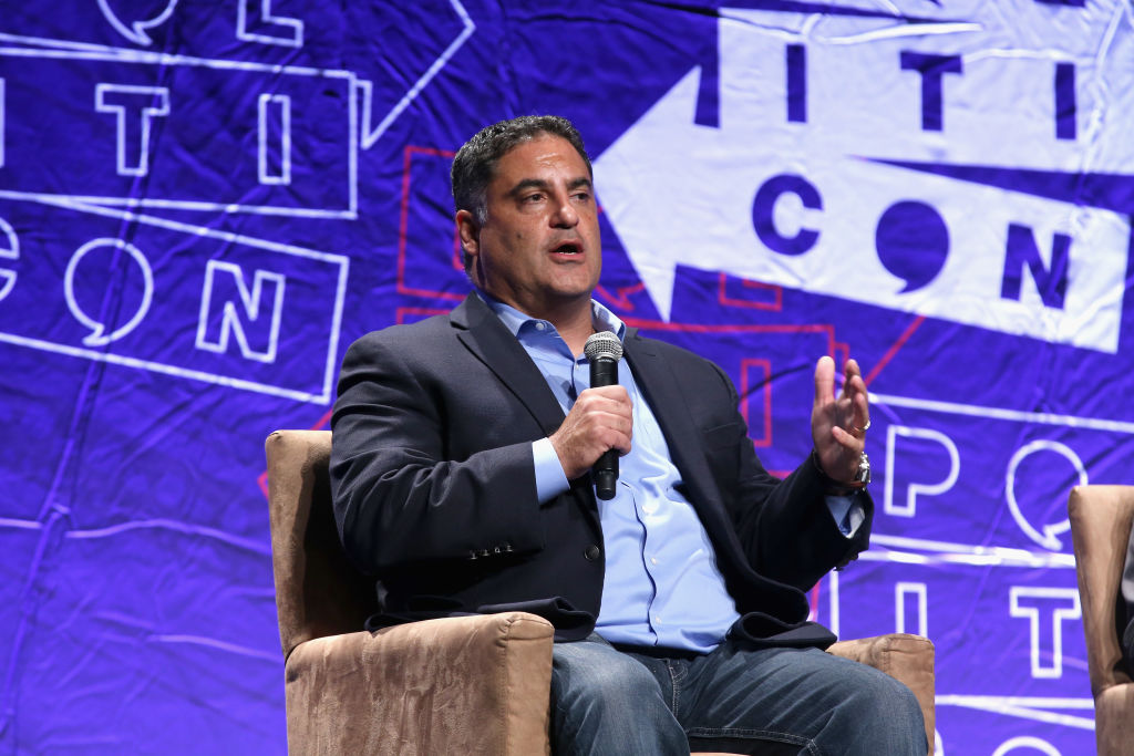 Cenk Uygur speaks onstage during Politicon 2018 at Los Angeles Convention Center in Los Angeles, California on October 21, 2018. (Phillip Faraone—Getty Images)
