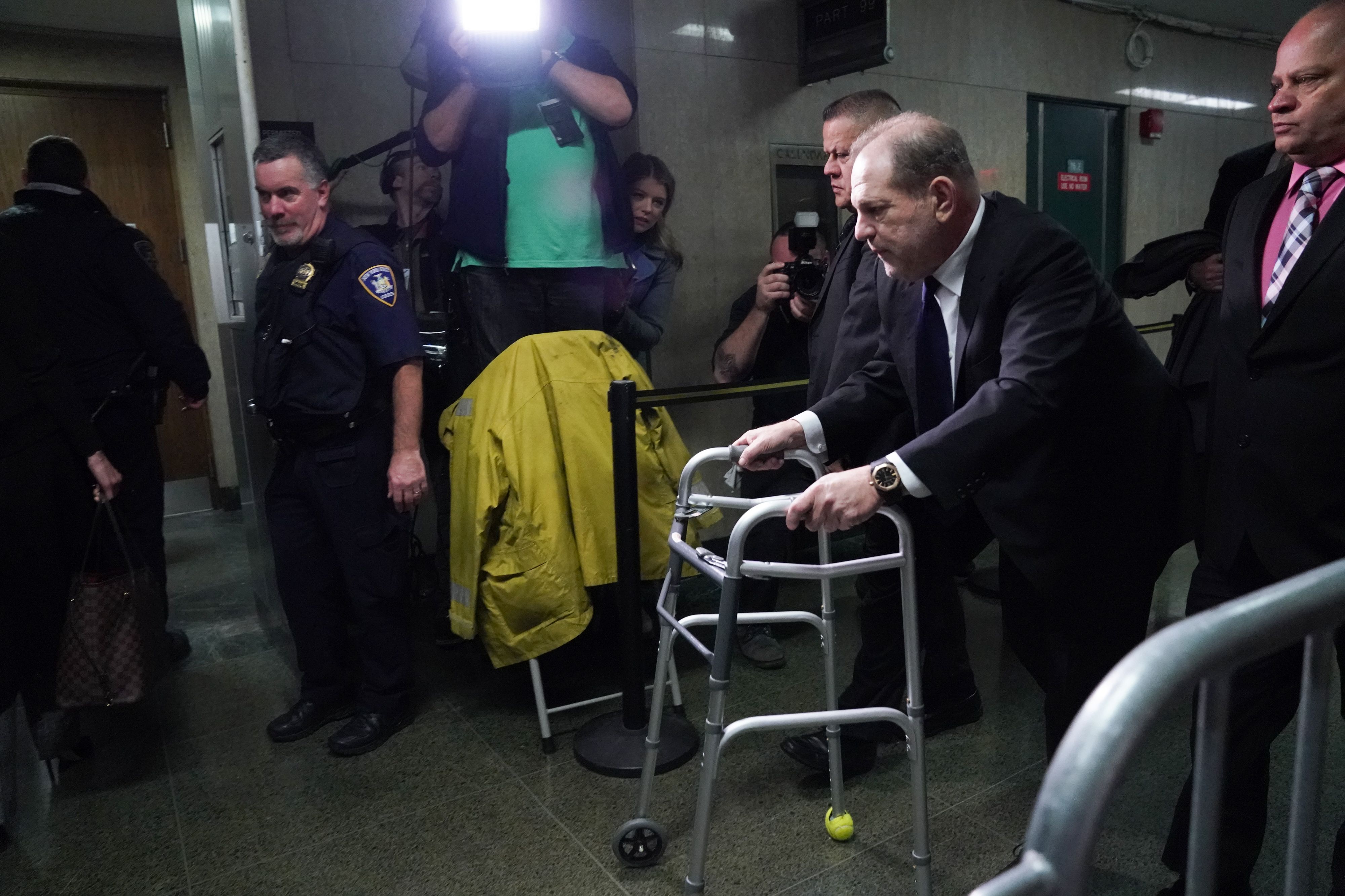 Harvey Weinstein leaves Manhattan Criminal Court, using a walker, following a hearing on December 11, 2019 in New York. (AFP via Getty Images)