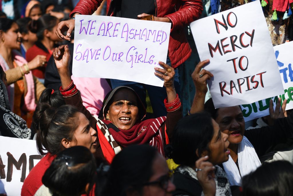 Social activists and supporters shout slogans to protest against the alleged rape and murder of a 27-year-old veterinary doctor in Hyderabad, during a demonstration in New Delhi on December 3, 2019. (Photo by Sajjad Hussain/AFP via Getty Images)