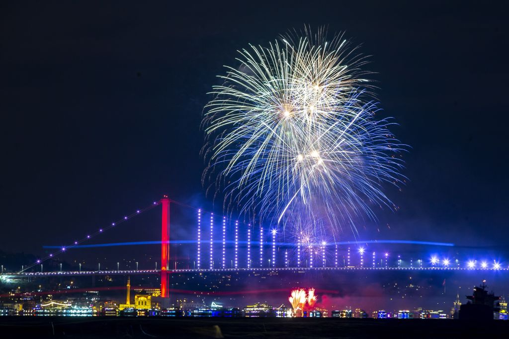 Fireworks go off in front of July 15 Martyrs' Bridge within the new year celebrations in Istanbul, Turkey on January 01, 2020. (Arif Hudaverdi Yaman—Anadolu Agency/Getty Images)
