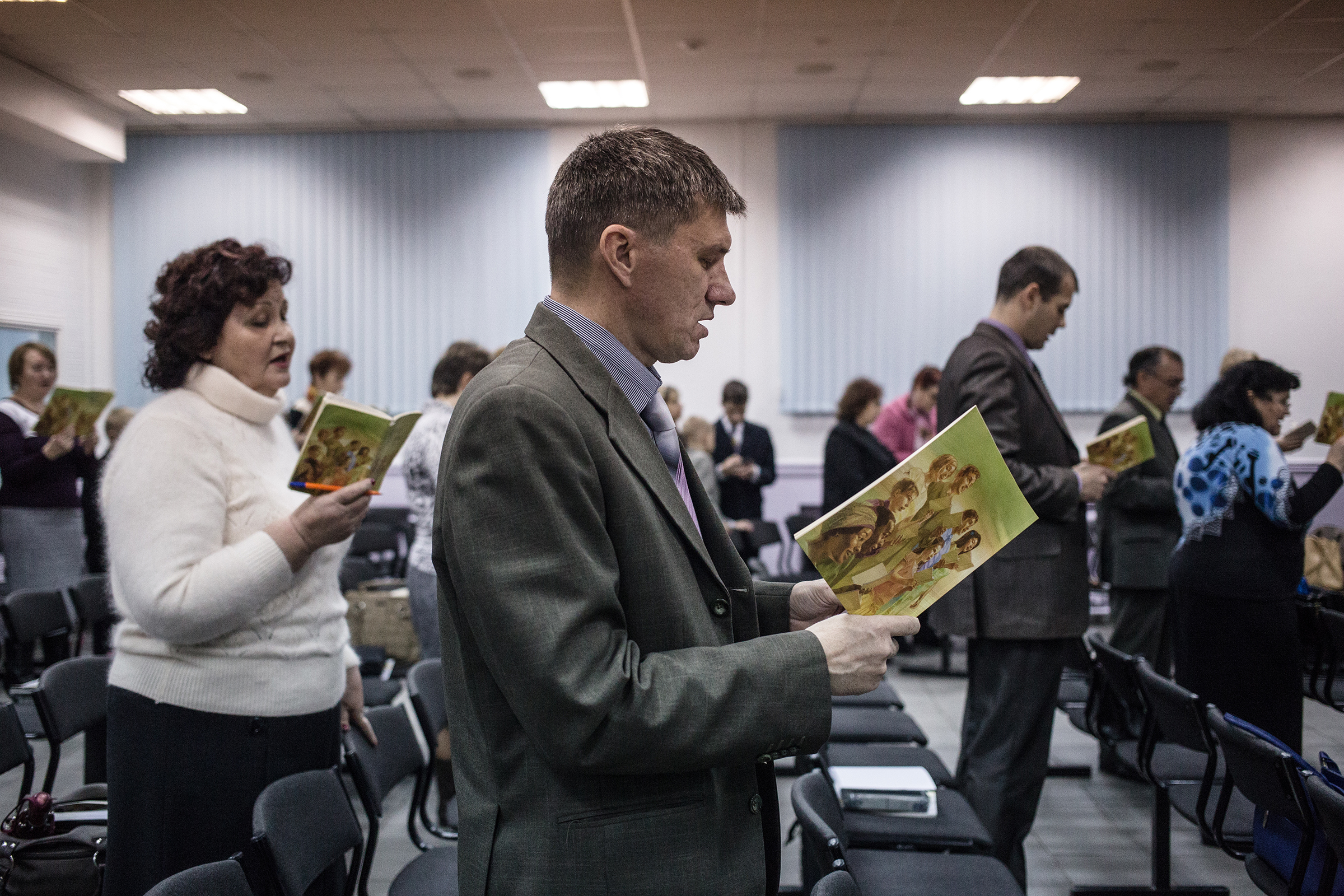 Jehovah's Witnesses sing songs at the beginning of a meeting in Rostov-on-Don on Nov. 13, 2015. (Alexander Aksakov—For The Washington Post via Getty Images)