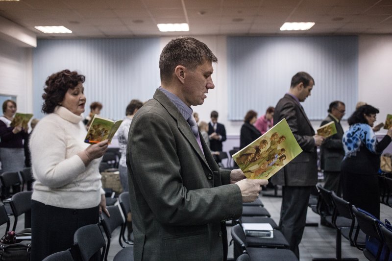Jehovah's Witnesses sing songs at the beginning of a meeting in Rostov-on-Don on Nov. 13, 2015.