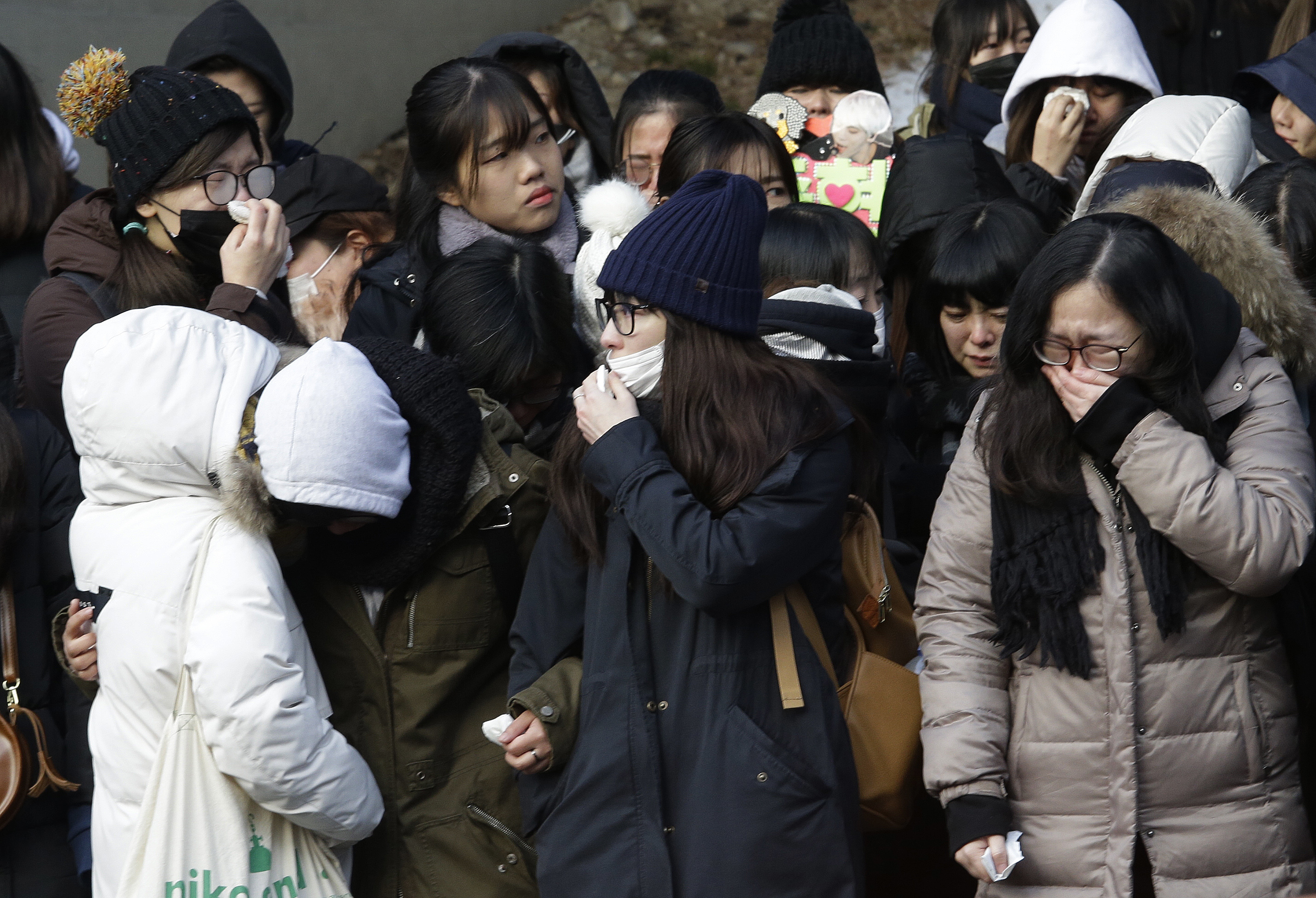 Fans react during the funeral of late South Korean singer Kim Jong-hyun, better known by the stage name Jonghyun, a member of South Korean K-pop group SHINee, in Seoul, South Korea on Dec. 21, 2017. (Ahn Young-joon&mdash;AP)