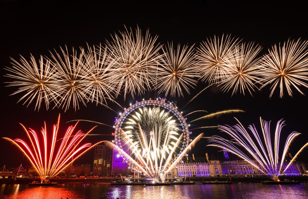 Fireworks light up the sky above the London Eye during the new year celebrations in London, United Kingdom on Jan. 1, 2020. (Vickie Flores—Anadolu Agency/Getty Images)