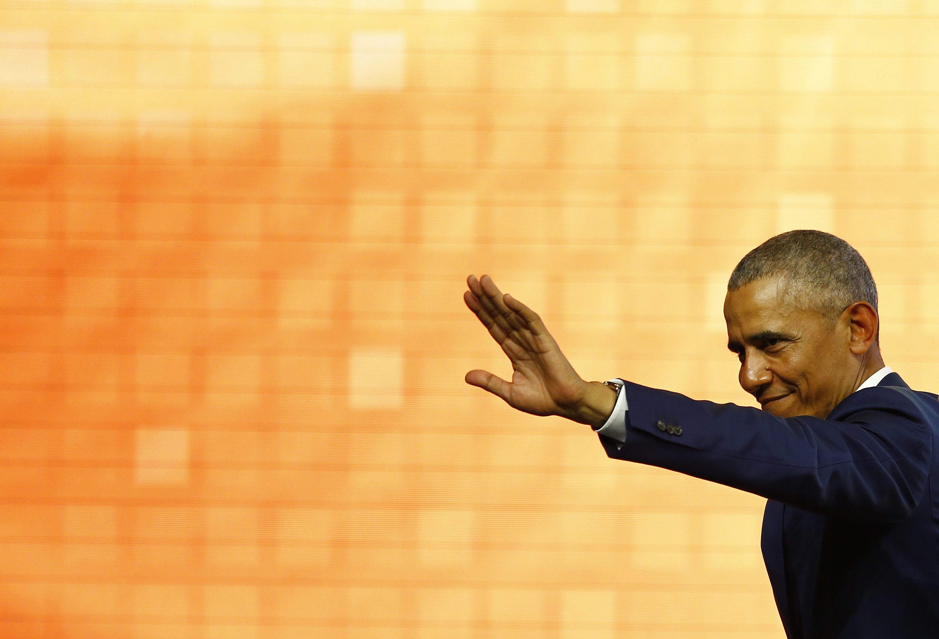 Former U.S. President Barack Obama waves during the World Travel and Tourism Council Global Summit on April 03, 2019 in Seville, Spain. (Marcelo del Pozo—Getty Images)