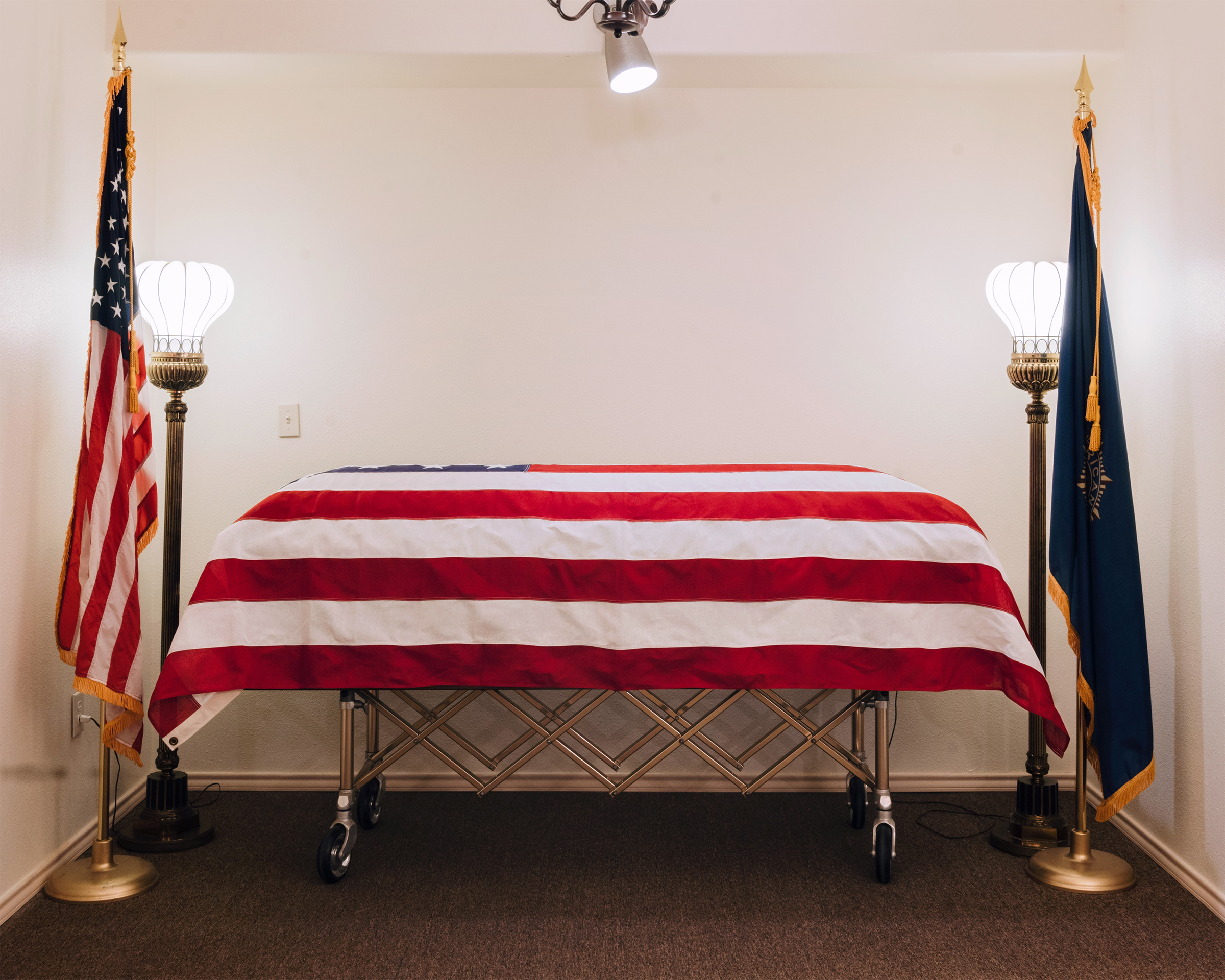 Victor 'Pat' Tumlinson's casket and remains, recently arrived at Duddlesten Funeral Home in Raymondville, TX on Dec. 6, 2019. (Bryan Schutmaat for TIME)