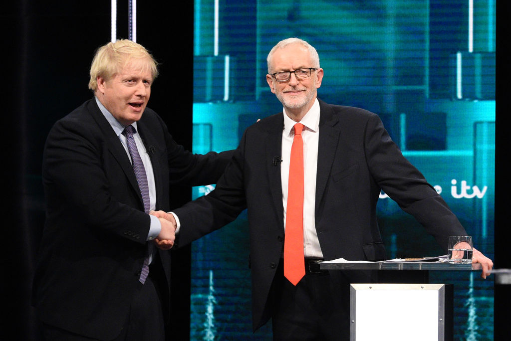 n this handout image supplied by ITV, Prime Minister Boris Johnson and Leader of the Labour Party Jeremy Corbyn shake hands during the ITV Leaders Debate at Media Centre on November 19, 2019 in Salford, England. (ITV via Getty Images&mdash;2019 ITV)