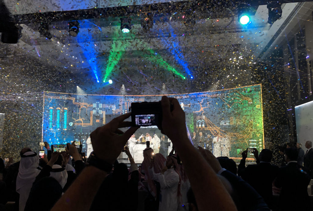 Participants take part in the ceremony to mark the initial public offering (IPO) of Saudi Aramco at the Fairmont Hotel in Riyadh, Saudi Arabia, on Wednesday, Dec. 11, 2019. (Matthew Martin—Bloomberg/Getty Images)