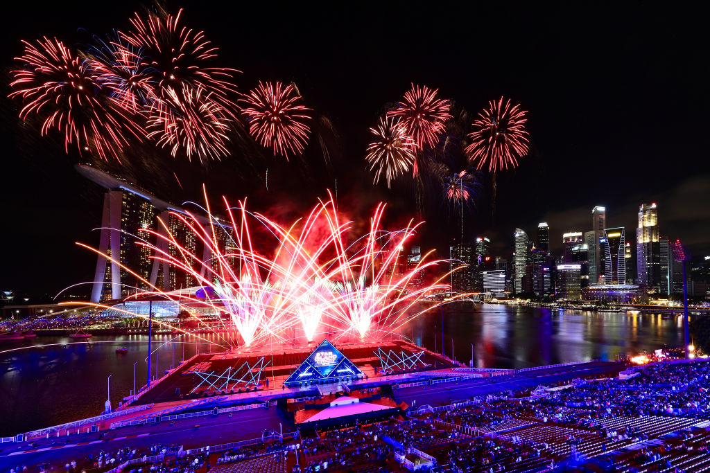 Singapore awaits 2020 with curtain-raiser fireworks by Star Island as revellers join in the biggest countdown celebration at Marina Bay on December 31, 2019 in Singapore. (Suhaimi Abdullah—Getty Images)