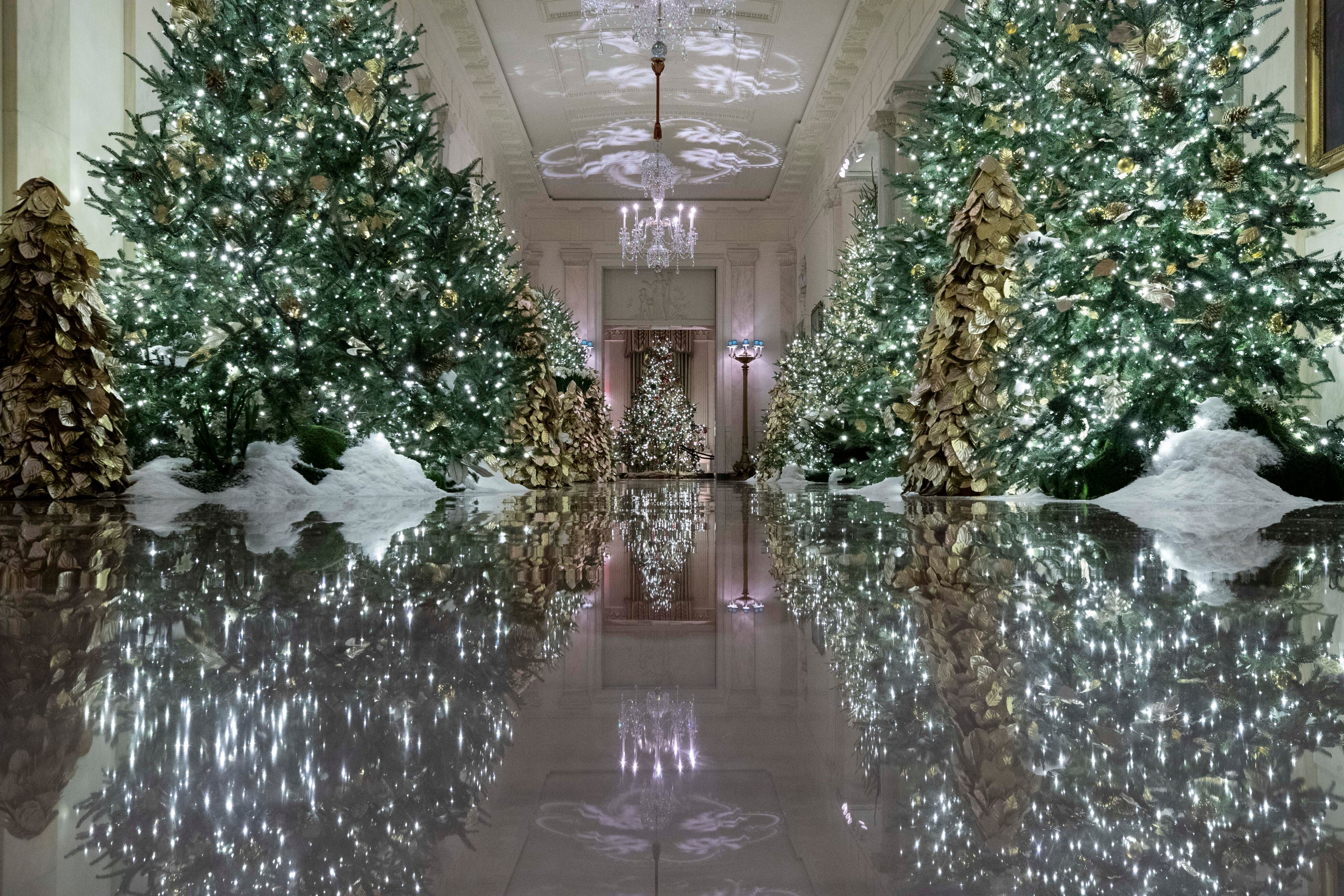 The Cross Hall leading into the State Dinning Room is decorated during the 2019 Christmas preview at the White House, Monday, Dec. 2, 2019, in Washington. (AP—Copyright 2019 The Associated Press. All rights reserved.)