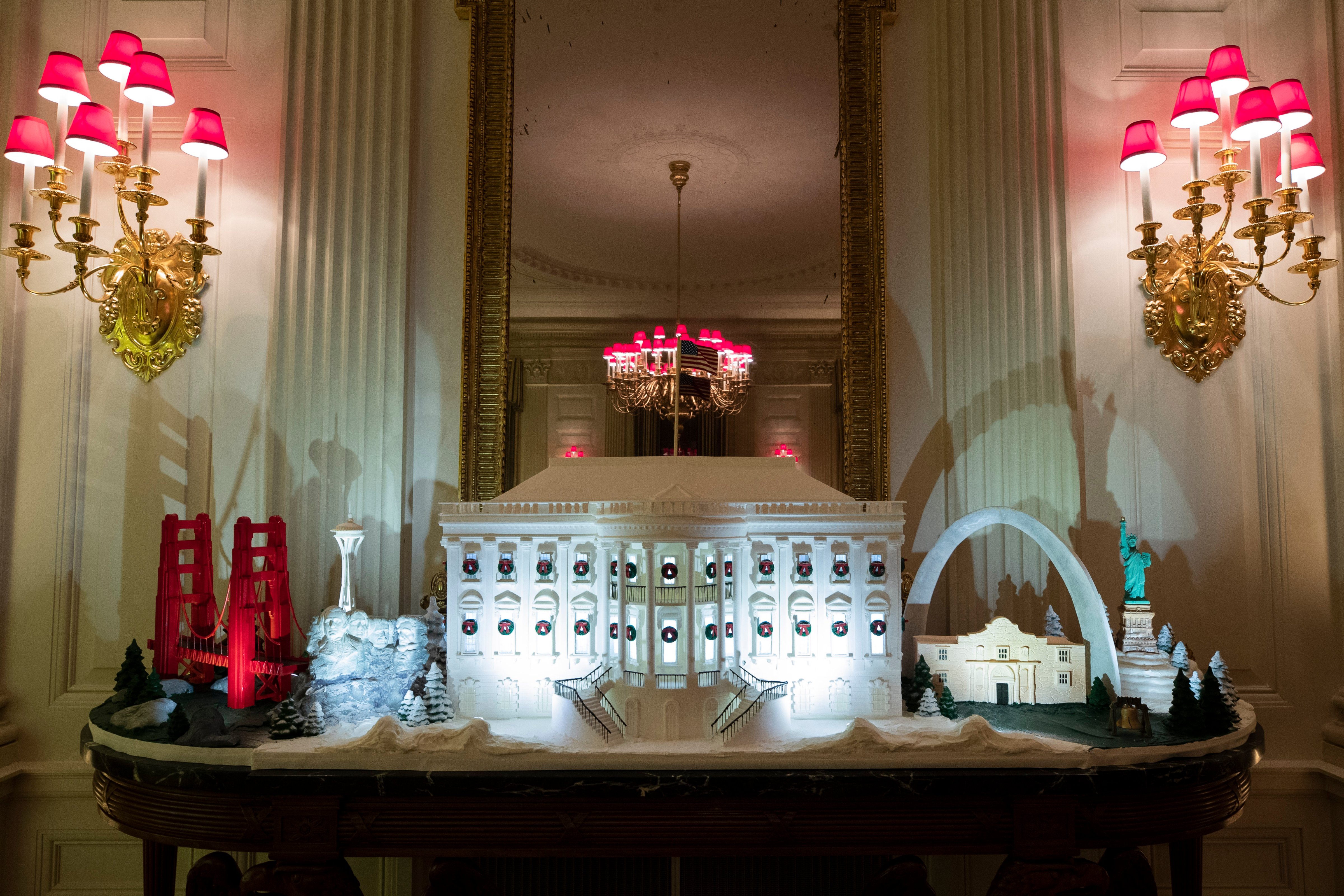 The White House made of gingerbread also features landmarks from around the country in the State Dinning Room during the 2019 Christmas preview at the White House, Monday, Dec. 2, 2019, in Washington. (AP—Copyright 2019 The Associated Press. All rights reserved.)