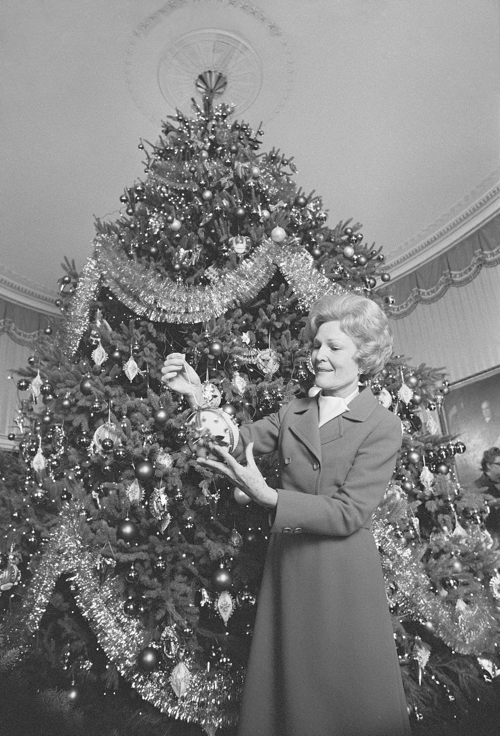 Here's First Lady Patricia Nixon decorating the Christmas Tree at the White House in Washington D.C. on Dec. 14, 1970. Burke says Melania drew inspiration from this year's approach. (Wally McNamee—Corbis via Getty Images)