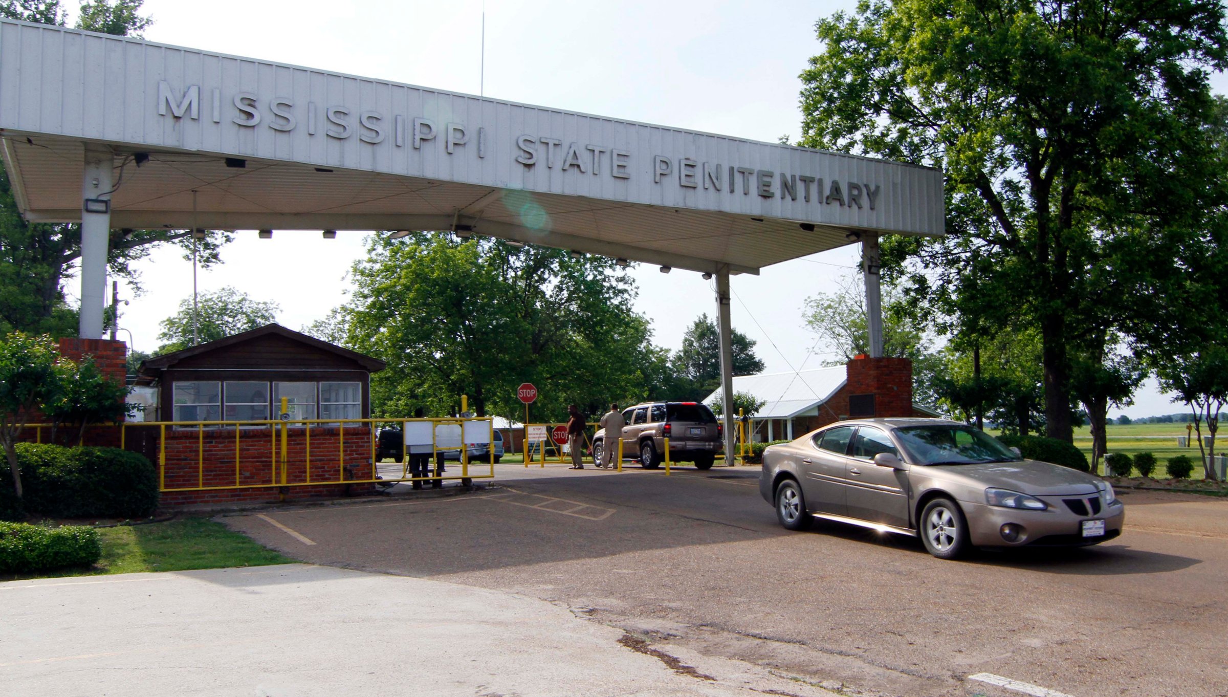 Traffic moves past the front of the Mississippi State Penitentiary in Parchman, Miss.
