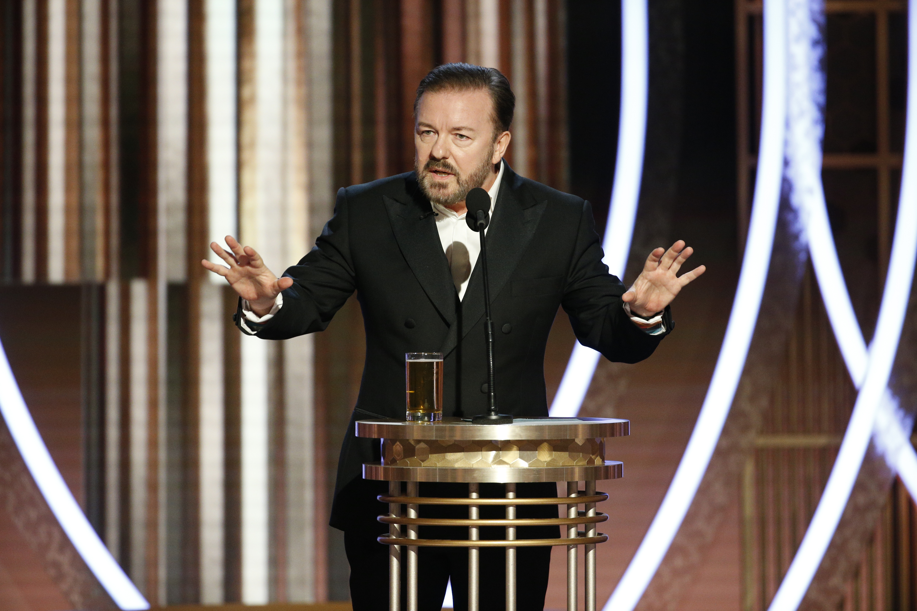 Host Ricky Gervais speaks onstage during the 77th Annual Golden Globe Awards. (Paul Drinkwater—NBCUniversal Media/Getty Images)