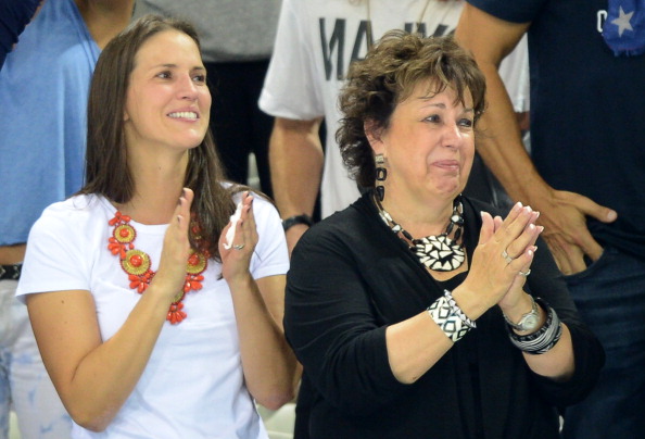 Debbie Phelps (R), mother of U.S. swimmer Michael Phelps cries during the podium ceremony of the men's 4x200m freestyle relay final during the swimming event at the London 2012 Olympic Games on July 31, 2012.