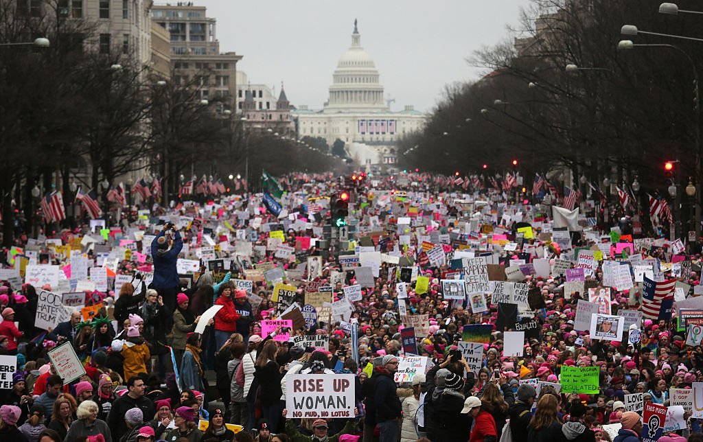 Protesters walk during the Women's March on Washington, with the U.S. Capitol in the background in Washington, D.C., on Jan. 21, 2017. (Mario Tama/Getty Images)