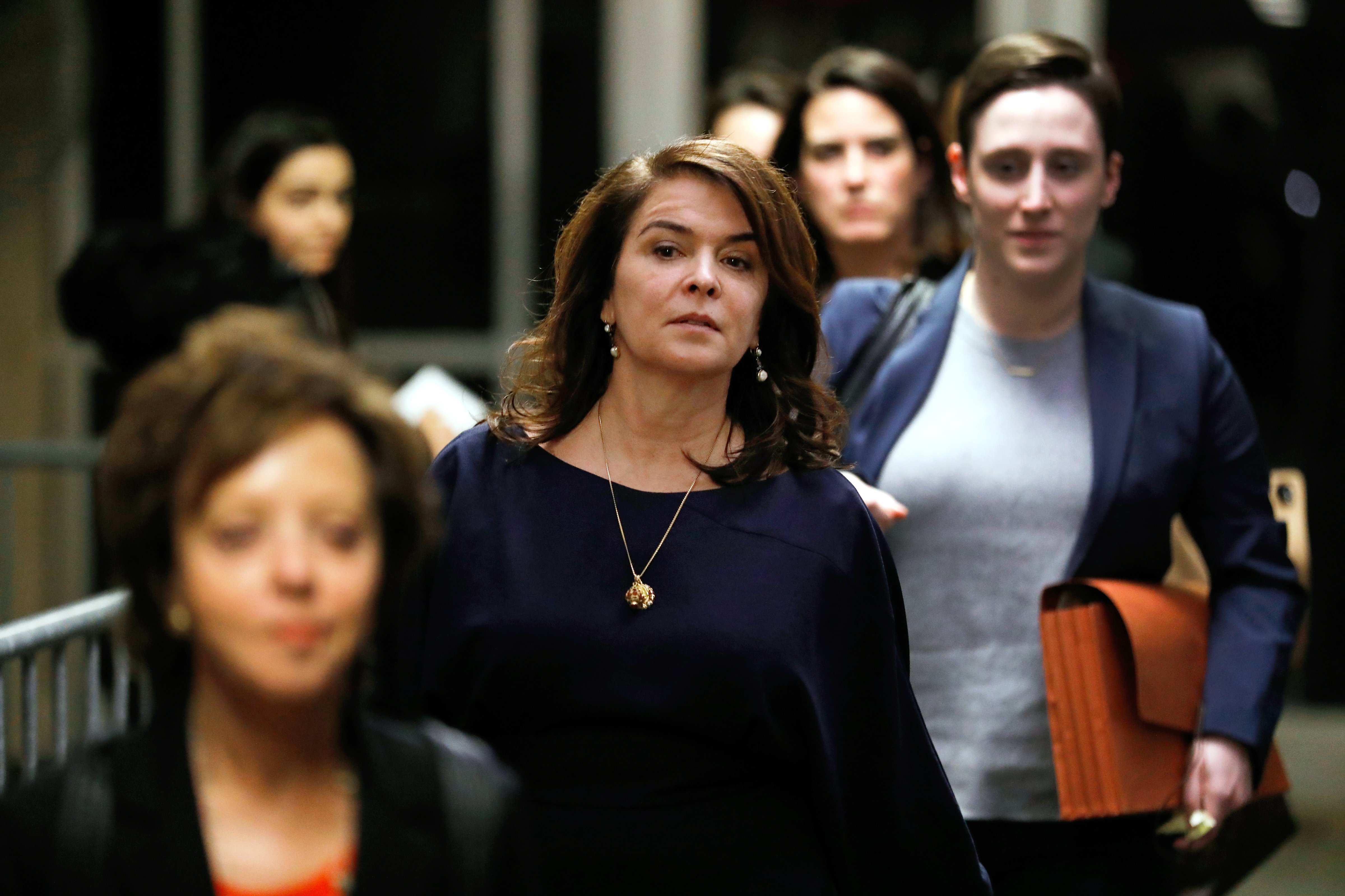Actress Annabella Sciorra, center, exits the court room during a break at state supreme court in New York on Jan. 23, 2020. (Peter Foley—Bloomberg/Getty Images)