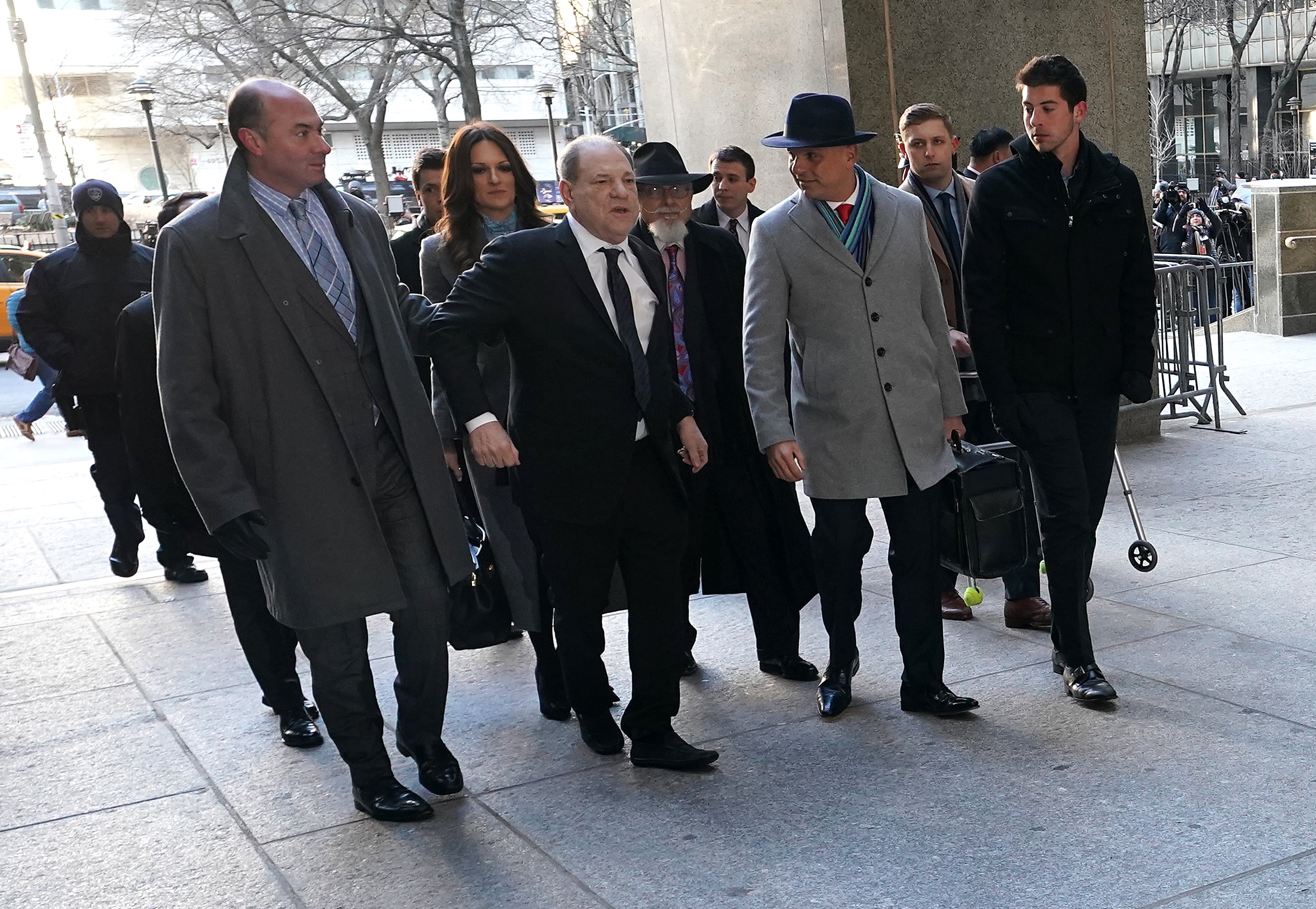Harvey Weinstein (C) arrives at the Manhattan Criminal Court, on Jan. 22, 2020 for opening arguments in his rape trial in New York City. (AFP via Getty Images)