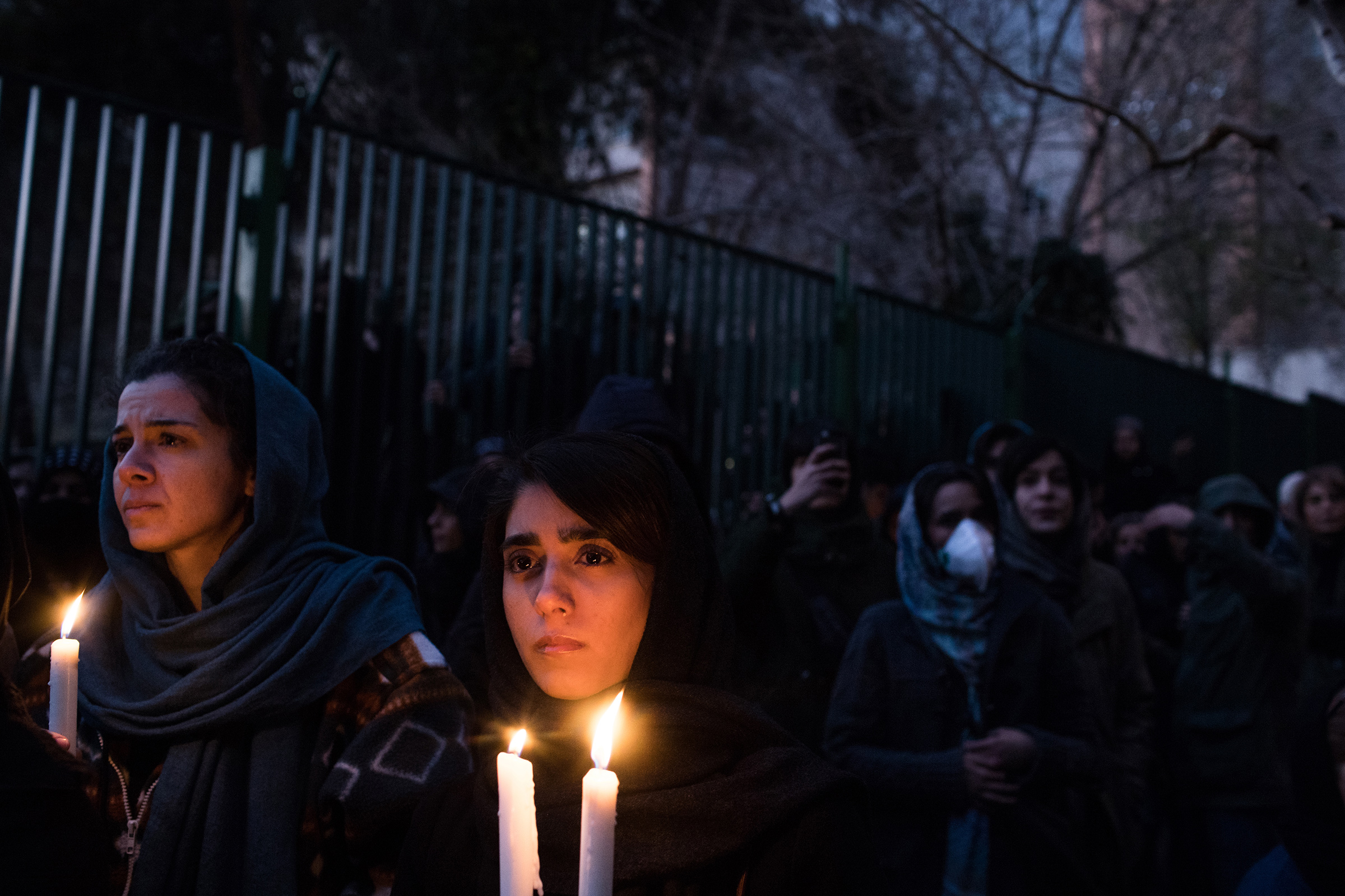 Demonstrators at a vigil in Tehran on Jan. 11 mourn victims of a plane crash caused by Iran’s military (Adil Hussain Bhat—Polaris)